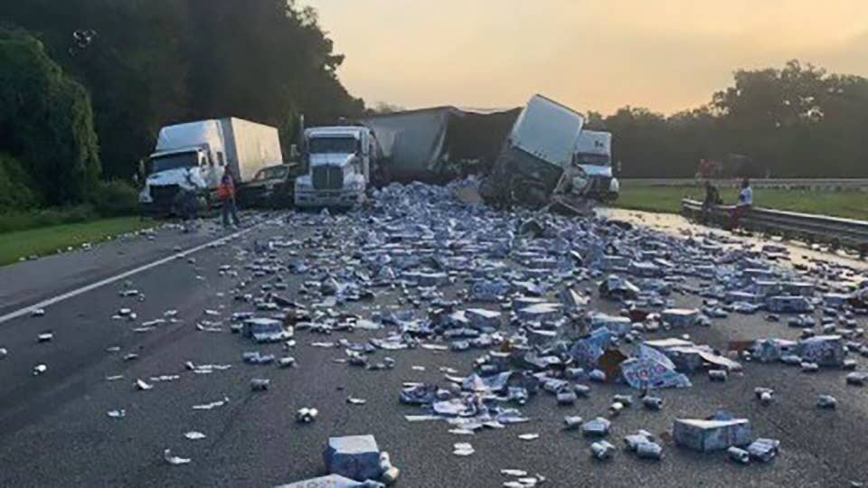 Beer covers I-75 in Florida after a multi-truck accident. No significant injuries were reported.