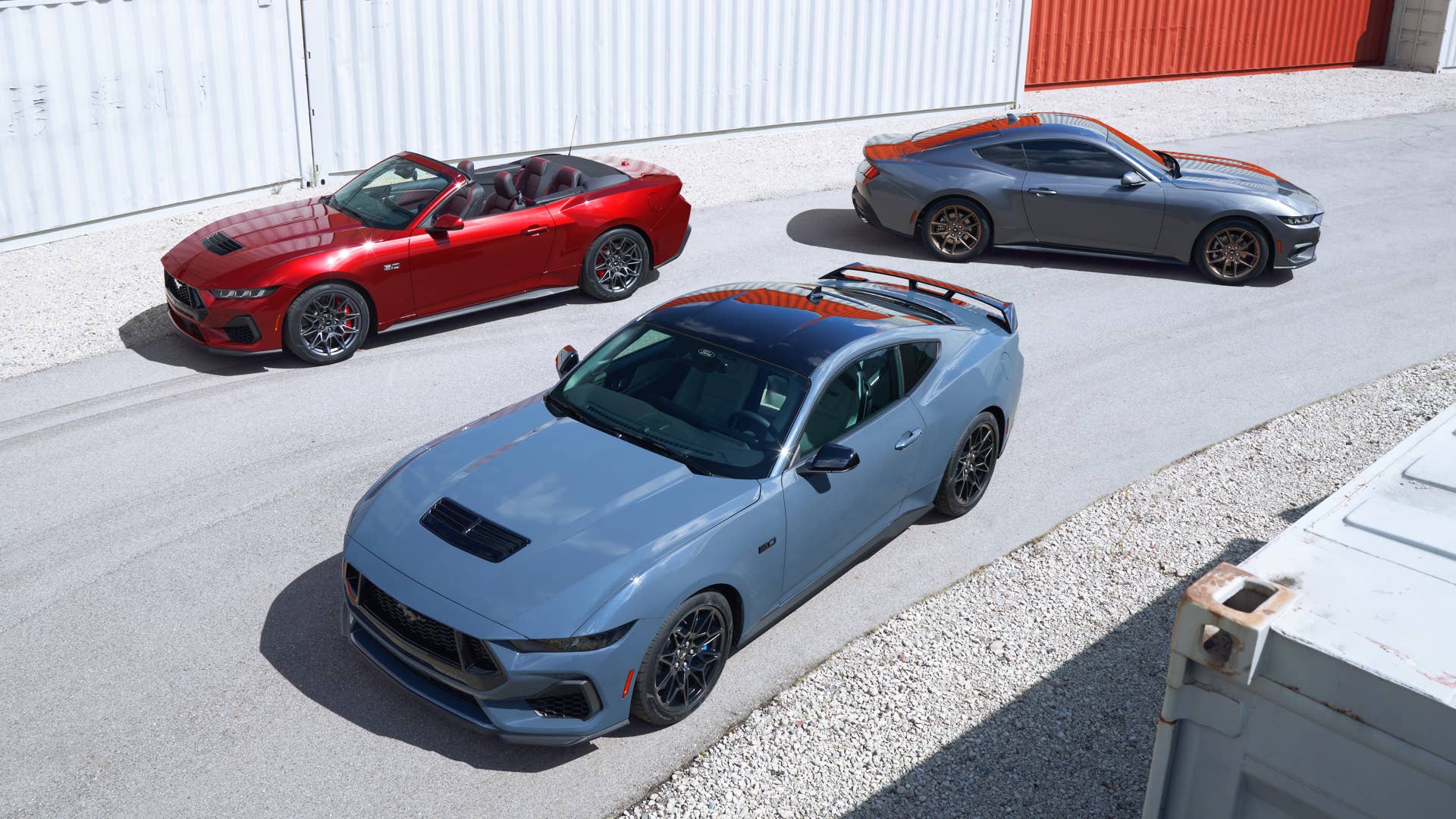 Pre-production vehicles shown.