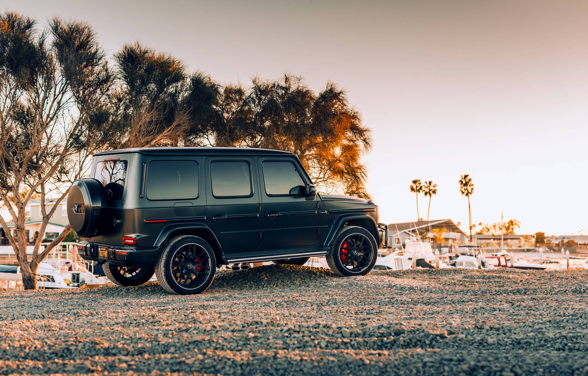 Seattle, WA, USAnMay 17, 2023nBlack G wagon parked with palm trees in the background