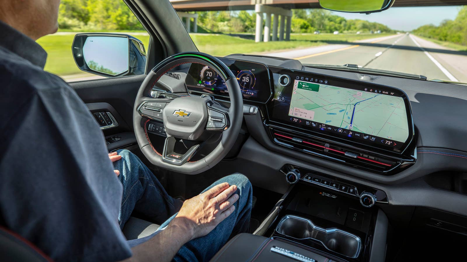 A view showing the driver using the Super Cruise hands-free system on the 2024 Silverado EV RST.