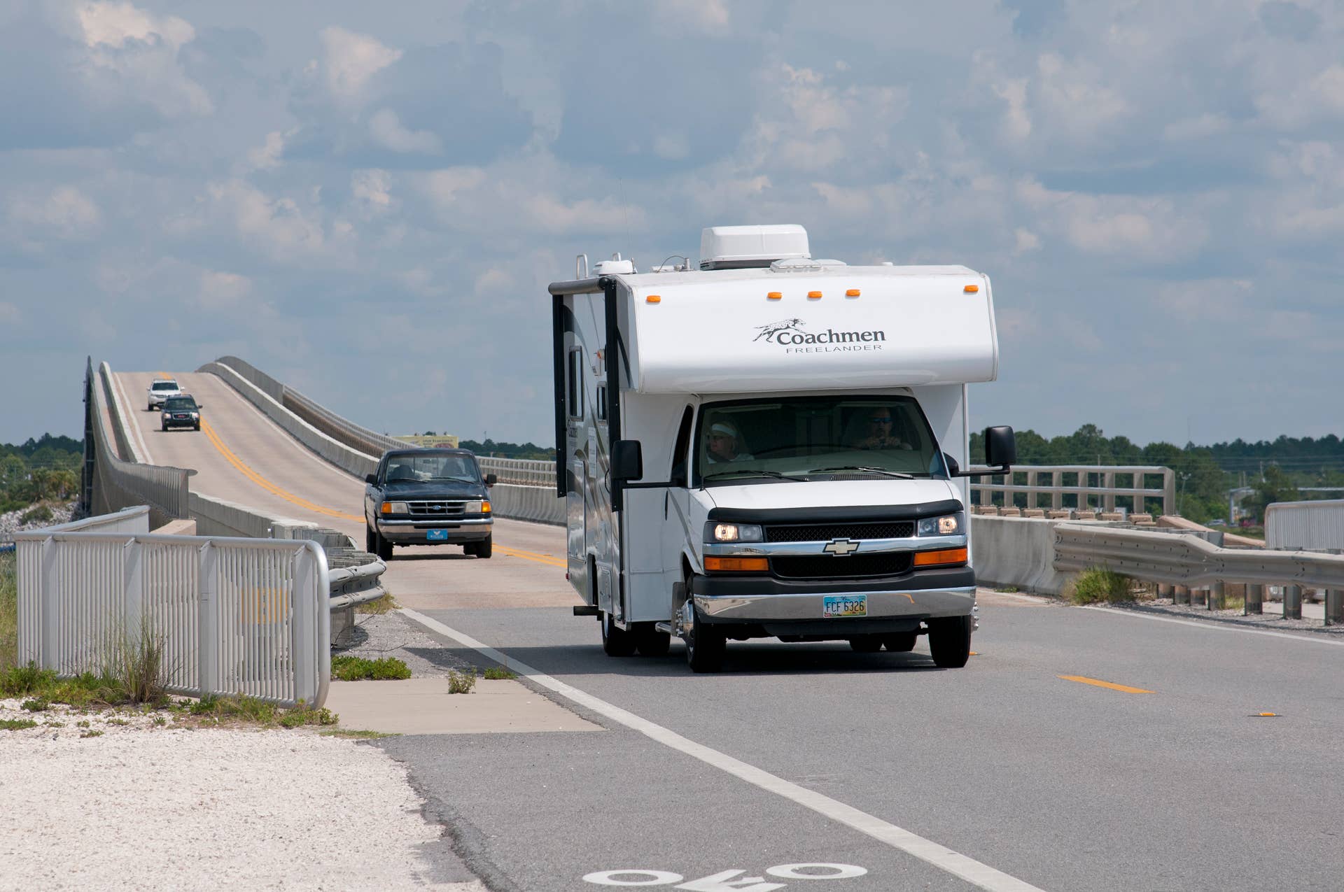 Motor home crossing the Navarre Beach Causeway northwest Florida USA. (Photo by: Education Images/Universal Images Group via Getty Images)