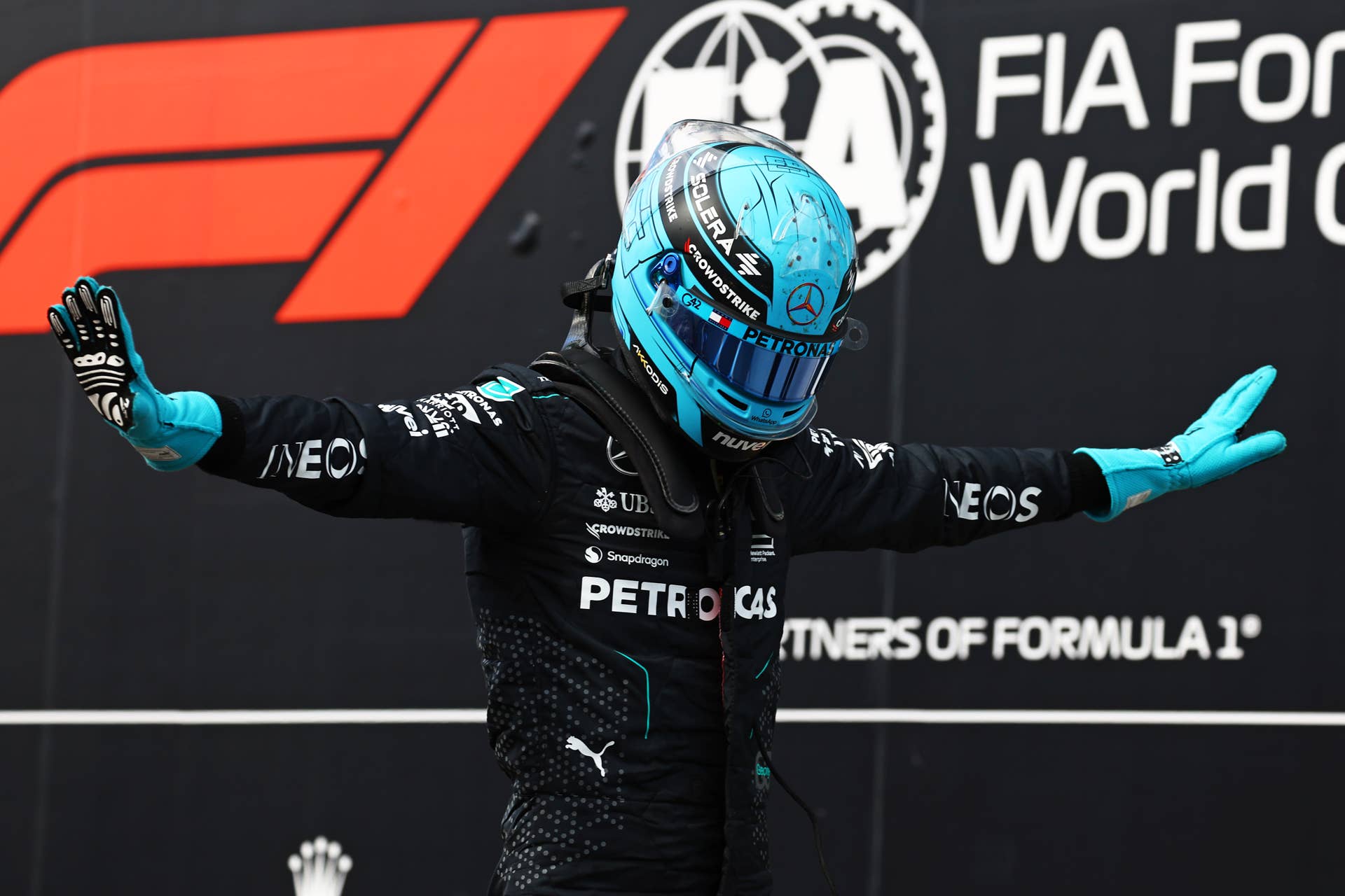 MONTREAL, QUEBEC - JUNE 08: Pole position qualifier George Russell of Great Britain and Mercedes celebrates in parc ferme during qualifying ahead of the F1 Grand Prix of Canada at Circuit Gilles Villeneuve on June 08, 2024 in Montreal, Quebec. (Photo by Mark Thompson/Getty Images)