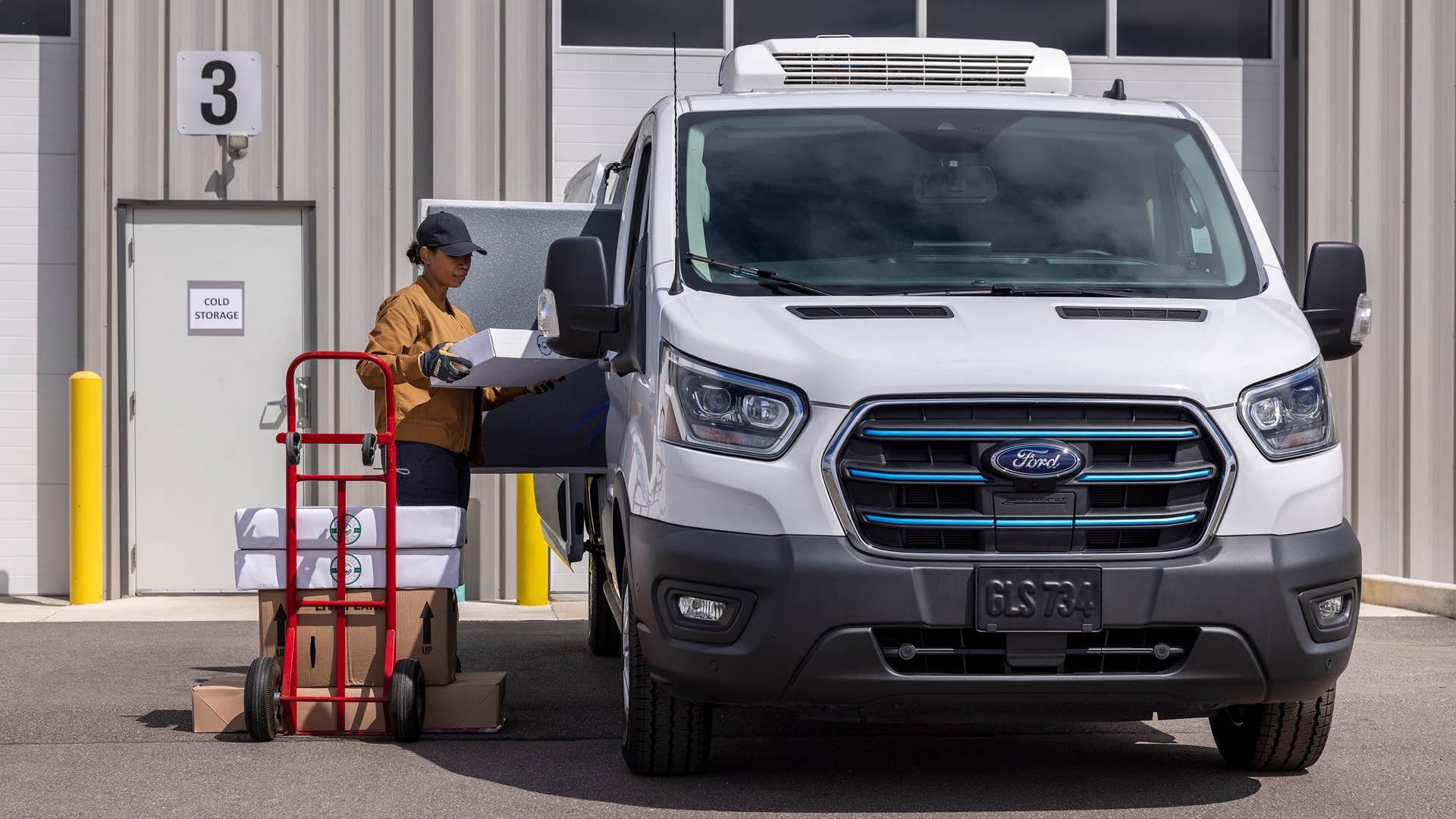 Taking your business farther, the new 2024 E-Transit with enhanced range supports work covering longer distances and provides more capability to unlock electric solutions for new use cases, like refrigerated delivery. (Available late 2024. Optional and aftermarket equipment shown.)