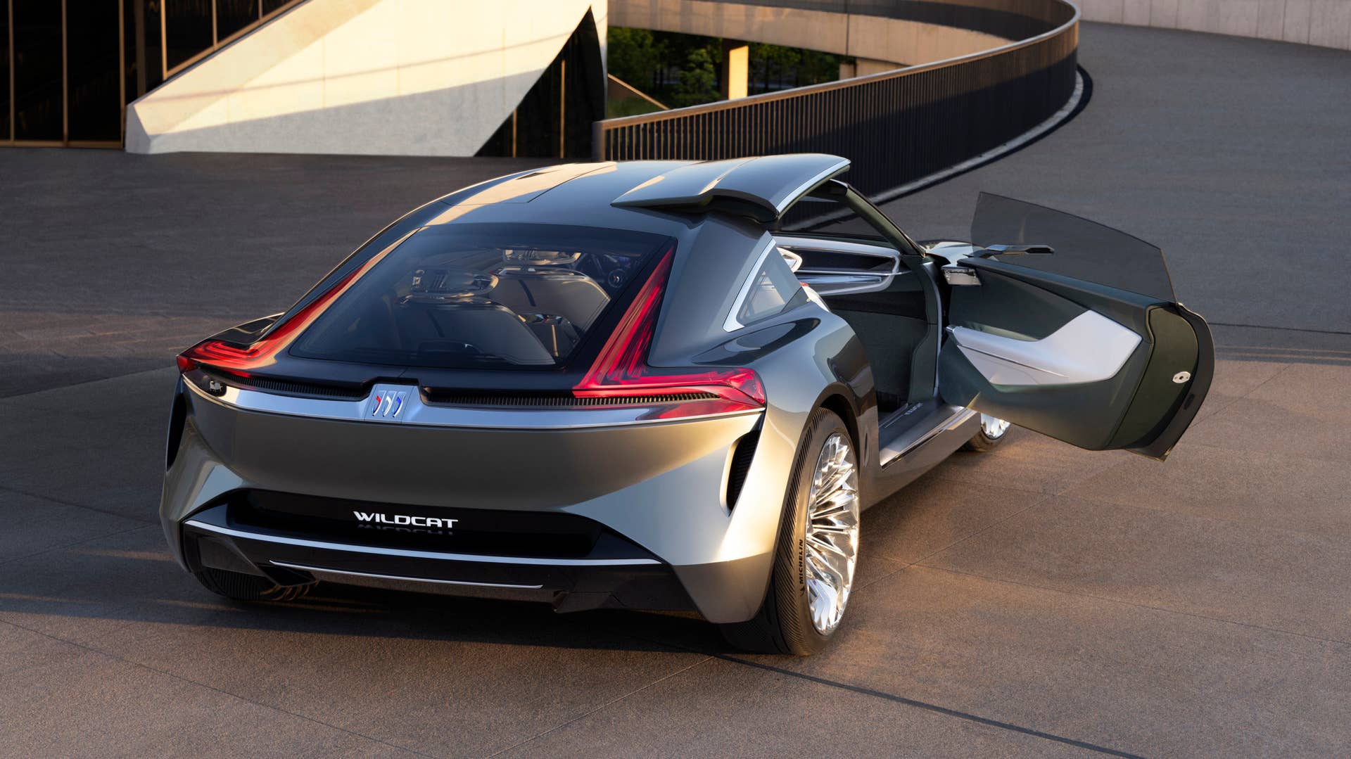 Buick Wildcat EV concept rear three-quarter with distinctive semi-swing doors that open on the passenger side.