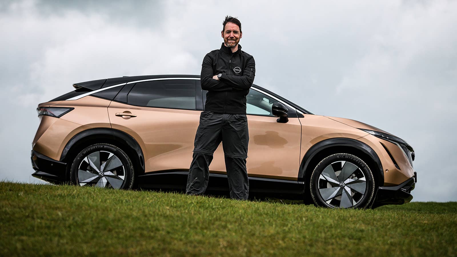 Chris Ramsey with a Nissan Ariya