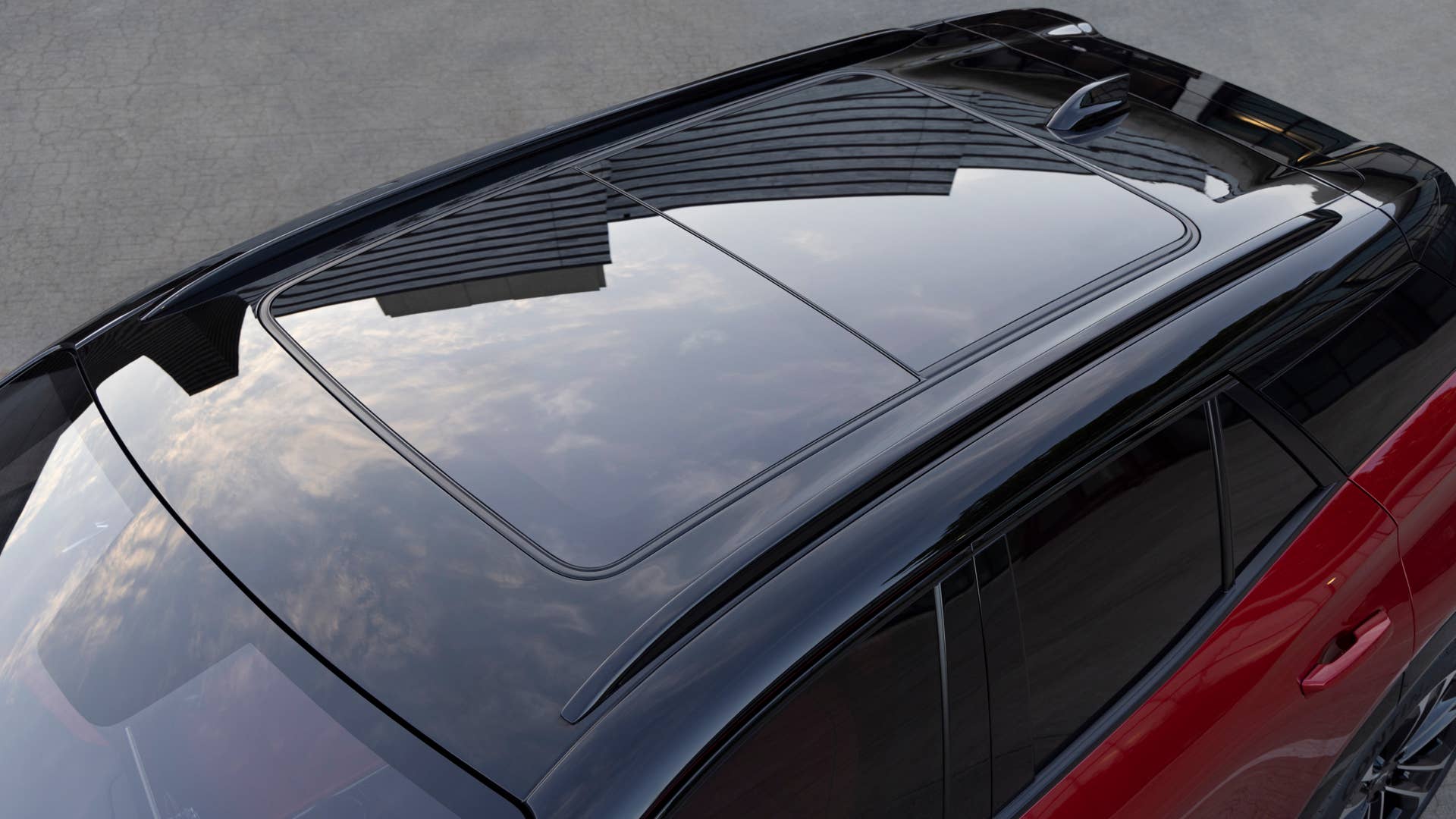 Overhead view of black sunroof on 2024 Chevrolet Blazer EV SS in Radiant Red Tintcoat. Preproduction model shown. Actual production model may vary. 2024 Chevrolet Blazer EV available Spring 2023.