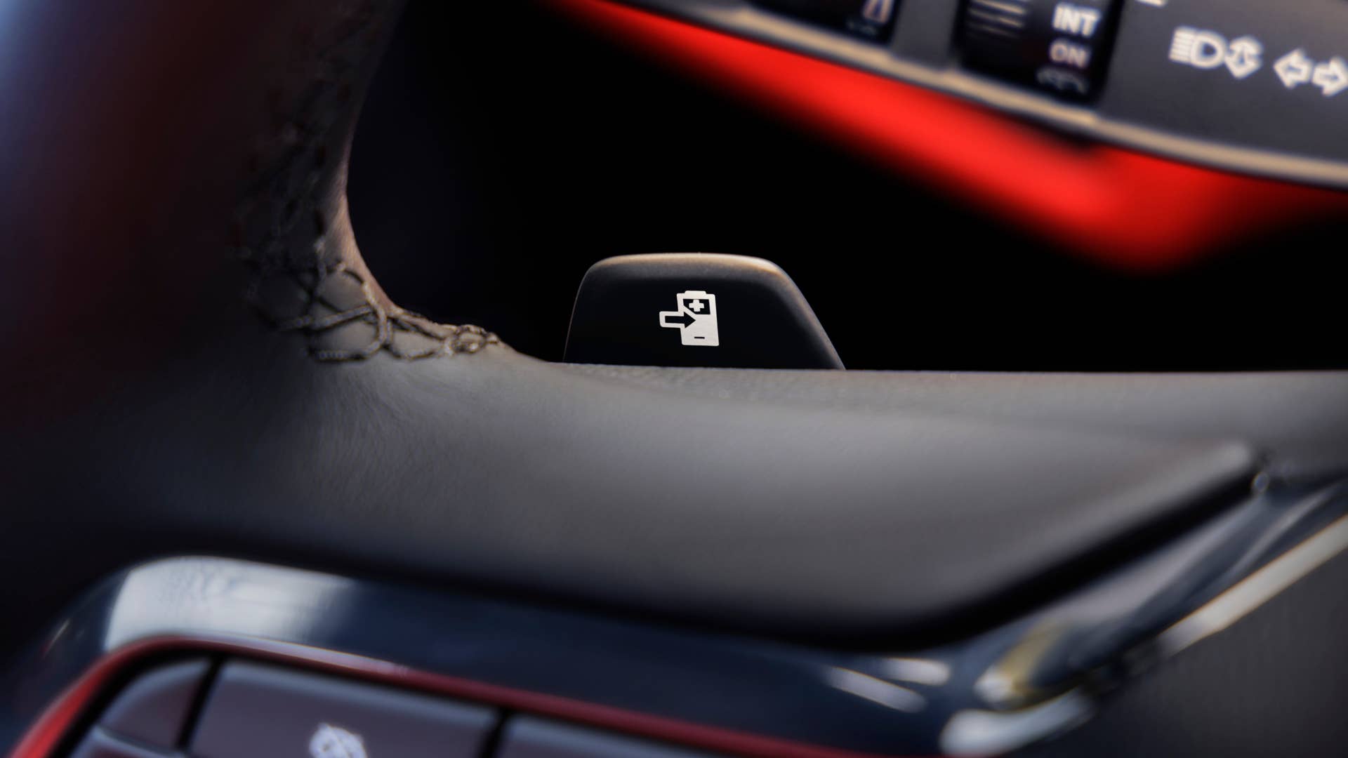 Close up of steering wheel in 2024 Chevrolet Blazer EV SS with Adrenaline Red interior. Preproduction model shown. Actual production model may vary. 2024 Chevrolet Blazer EV available Spring 2023.