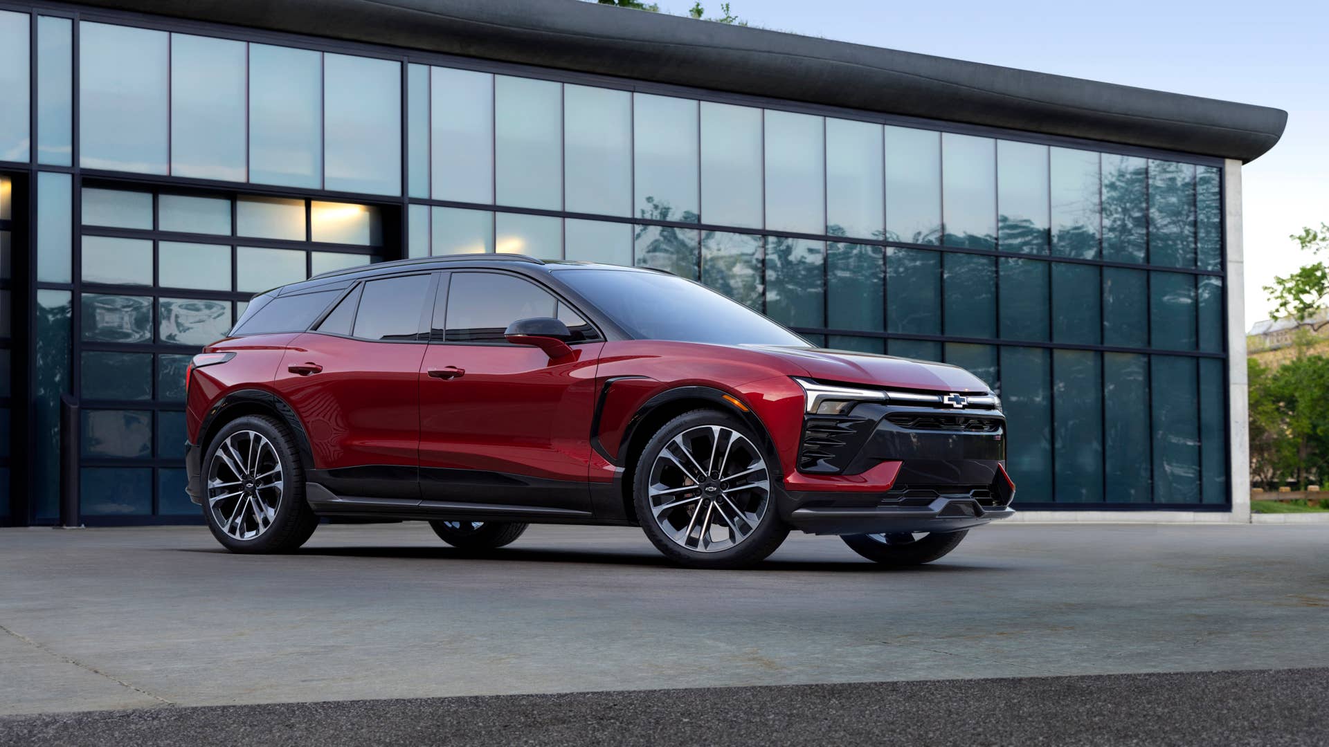 Passenger’s side 7/8 front view of 2024 Chevrolet Blazer EV SS in Radiant Red Tintcoat.  Preproduction model shown. Actual production model may vary. 2024 Chevrolet Blazer EV available Spring 2023.