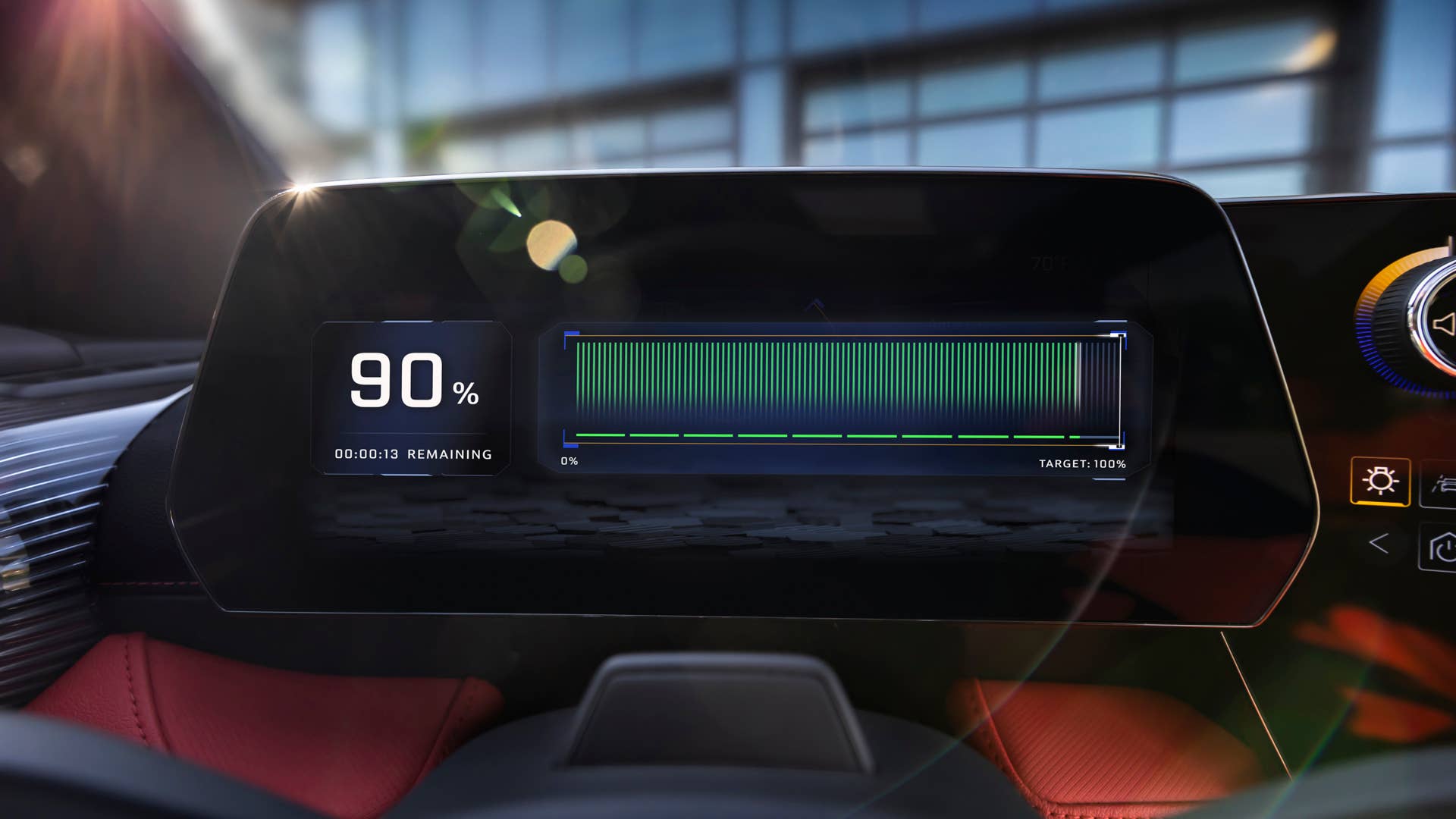 Front view of steering wheel and display screen on 2024 Chevrolet Blazer EV SS with Adrenaline Red interior. Preproduction model shown. Actual production model may vary. 2024 Chevrolet Blazer EV available Spring 2023.