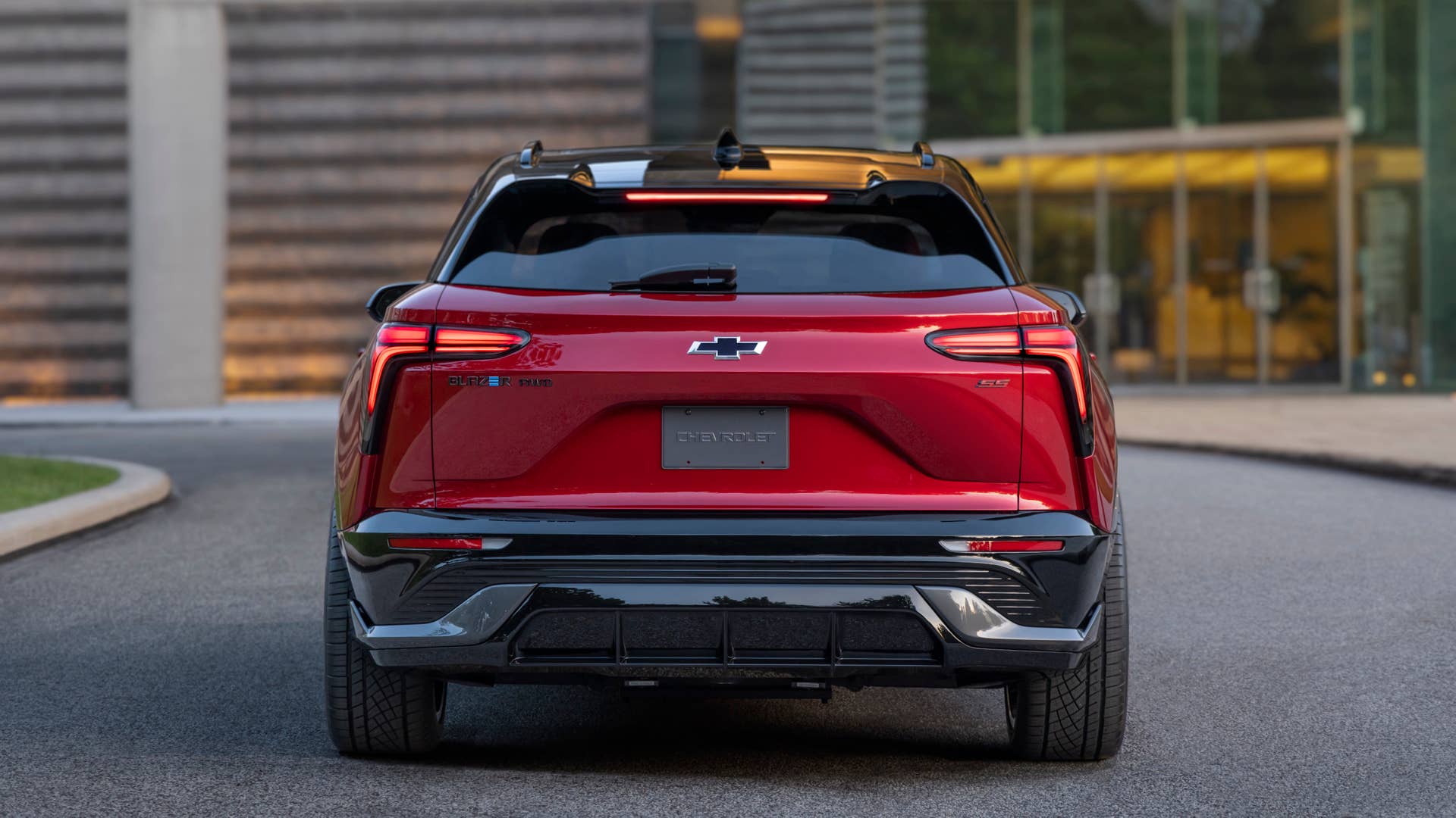 Rear view of 2024 Chevrolet Blazer EV SS in Radiant Red Tintcoat. Preproduction model shown. Actual production model may vary. 2024 Chevrolet Blazer EV available Spring 2023.