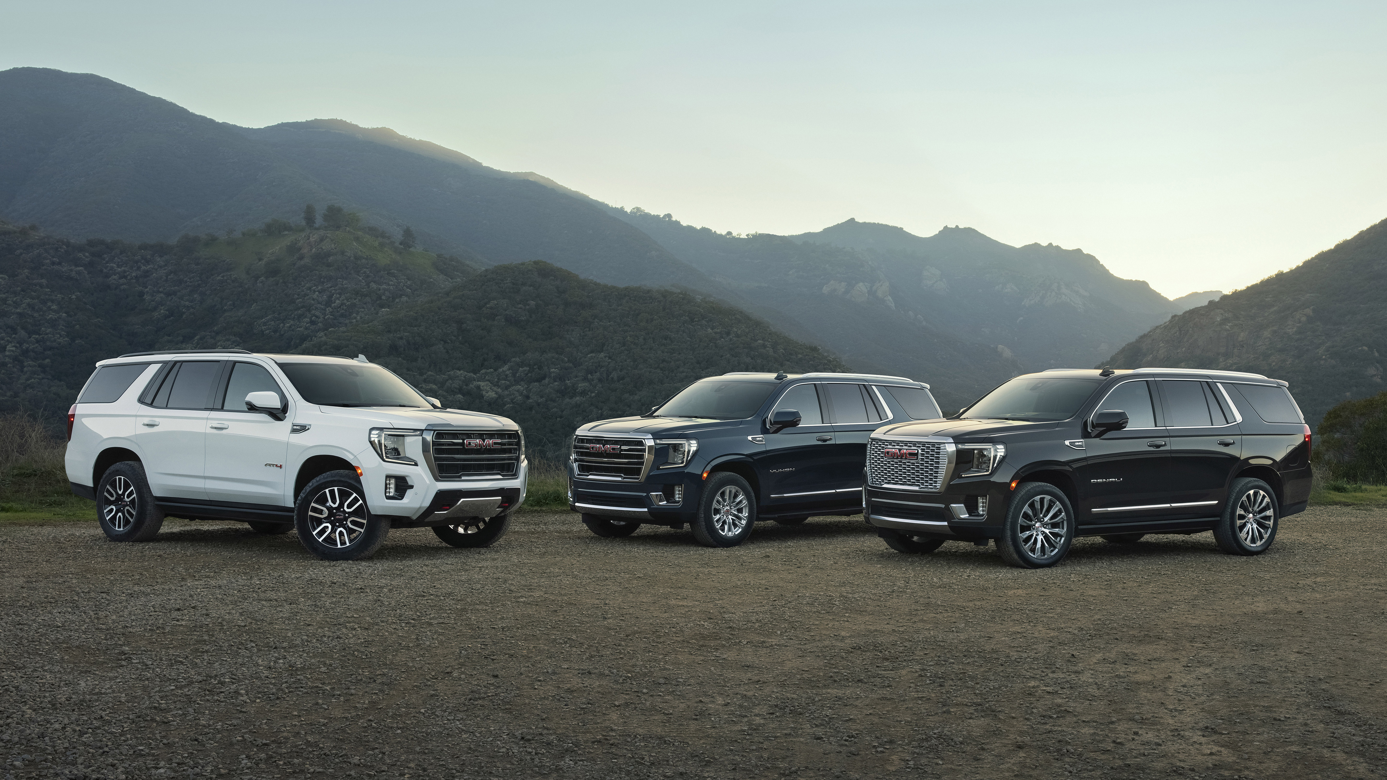 (l to r) 2022 GMC Yukon AT4, SLT and Denali