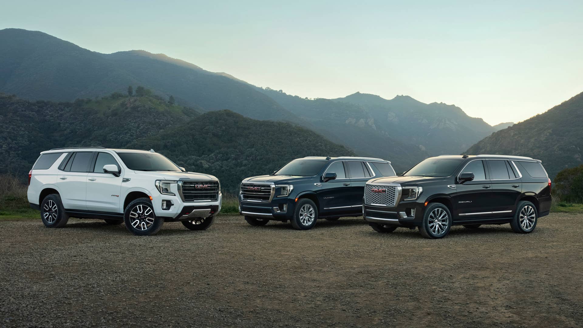 (l to r) 2022 GMC Yukon AT4, SLT and Denali