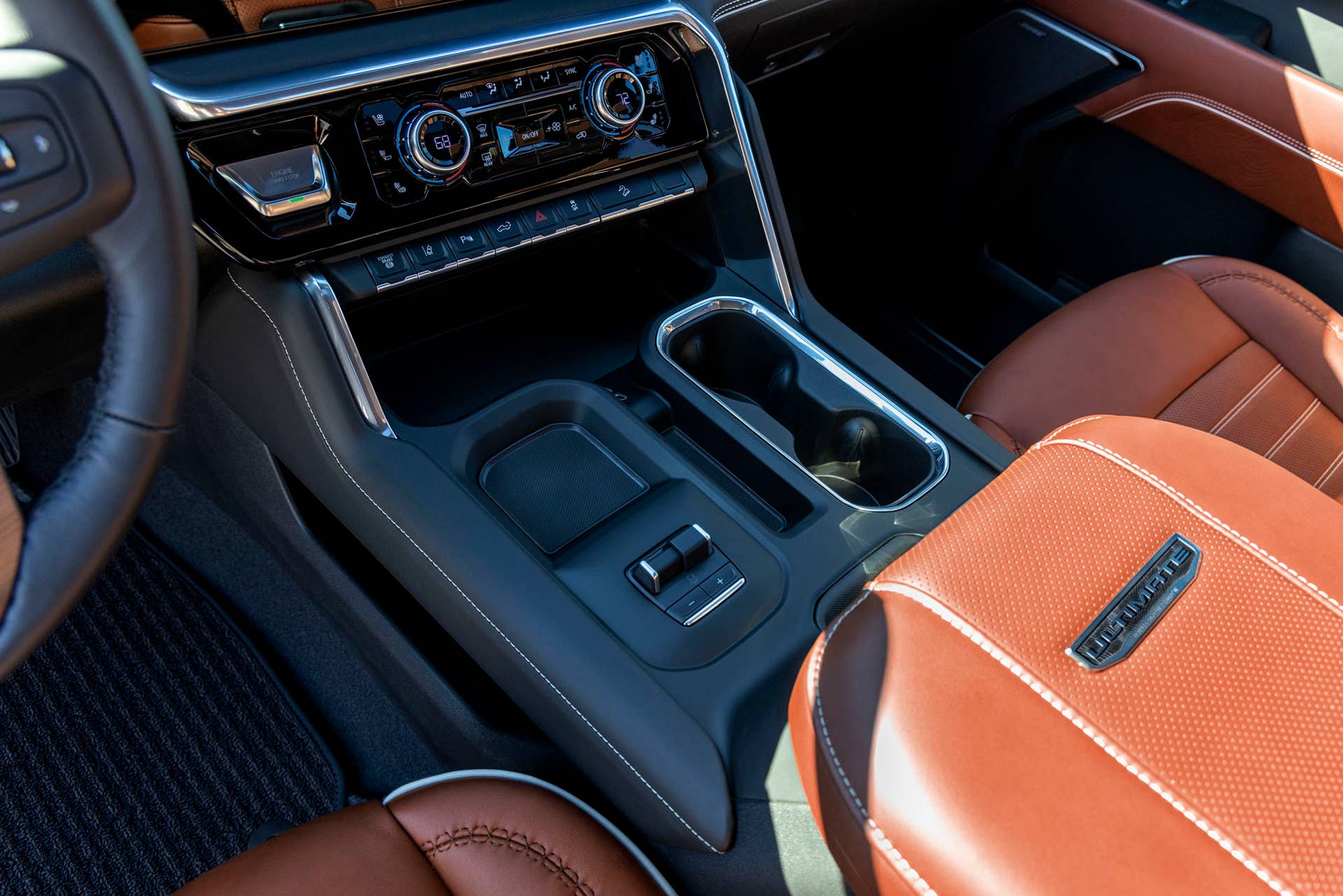 Interior close-up shot of GMC Sierra 2500 HD Denali Ultimate center console