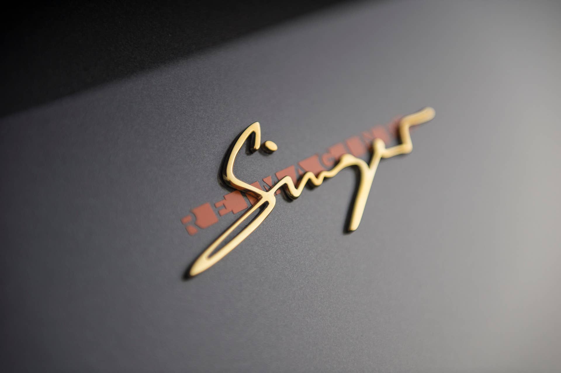 porsche 911 targa 4.0 restored by singer logo