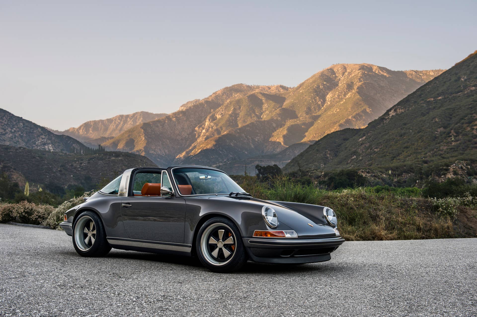 porsche 911 targa 4.0 restored by singer front gray mountains