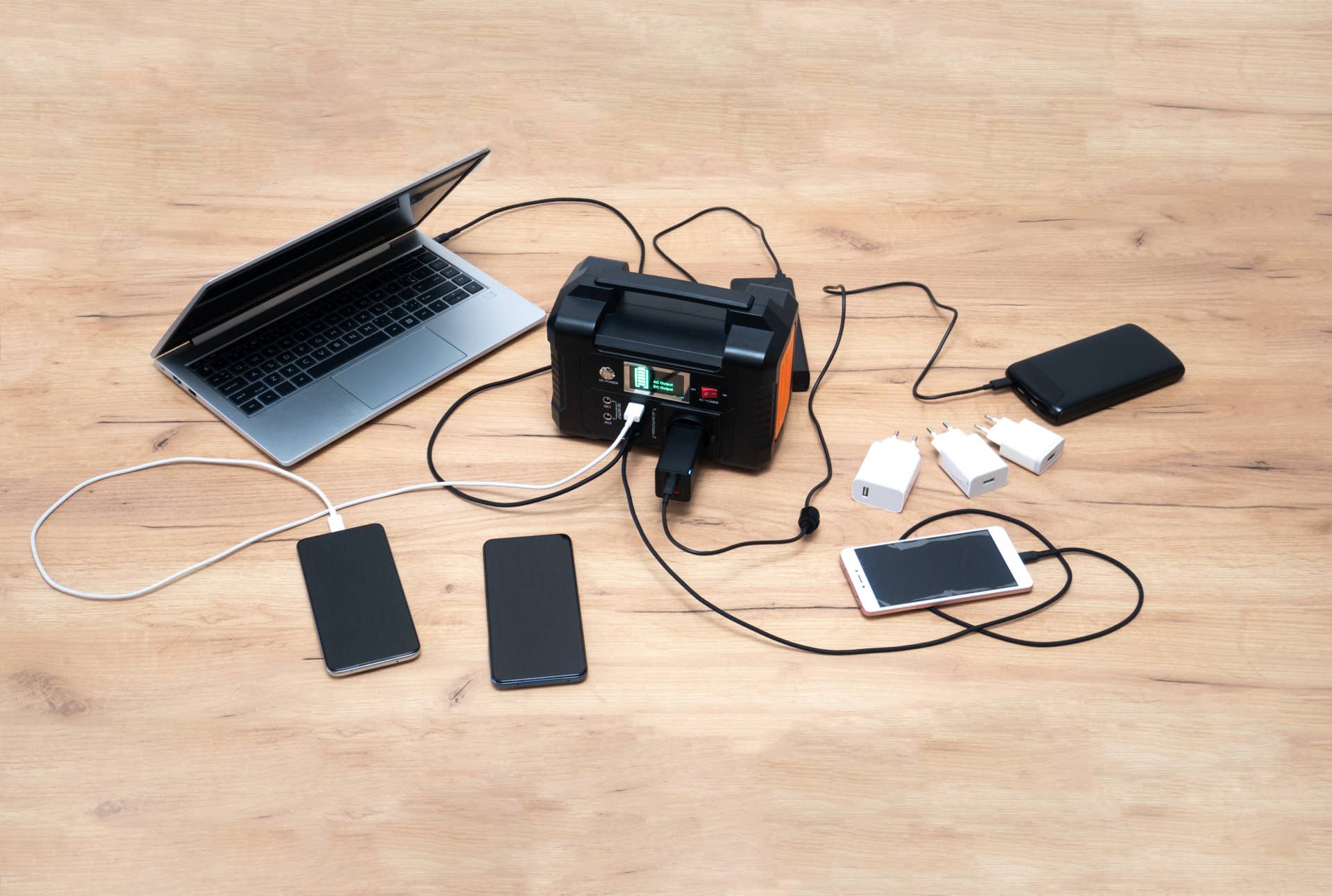 lithium Portable Power Station is charging laptop smartphonesnPower banks and other gadgets.nModern, information technology.