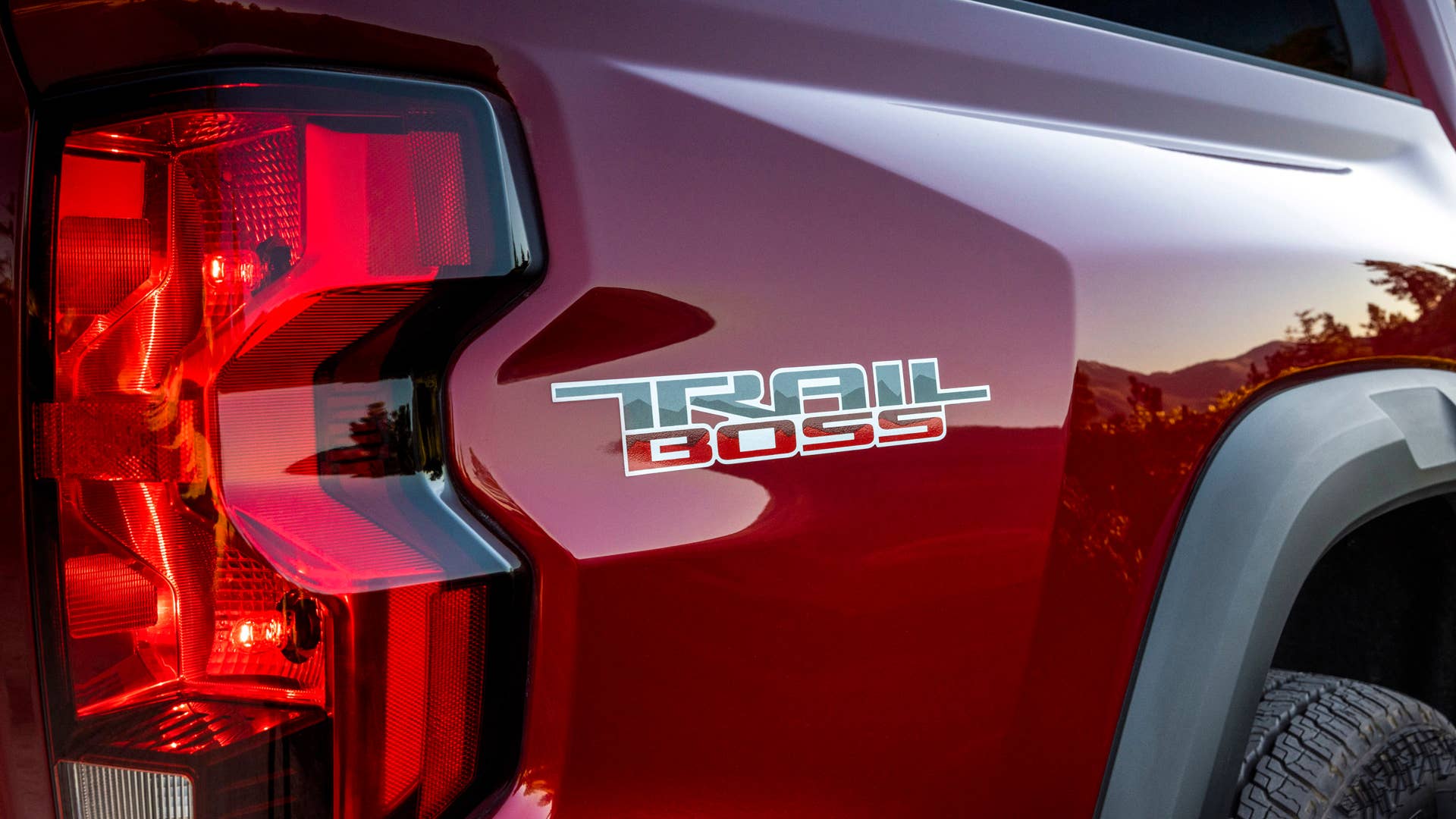 Detail shot of "Trail Boss" badge and rear taillamp.