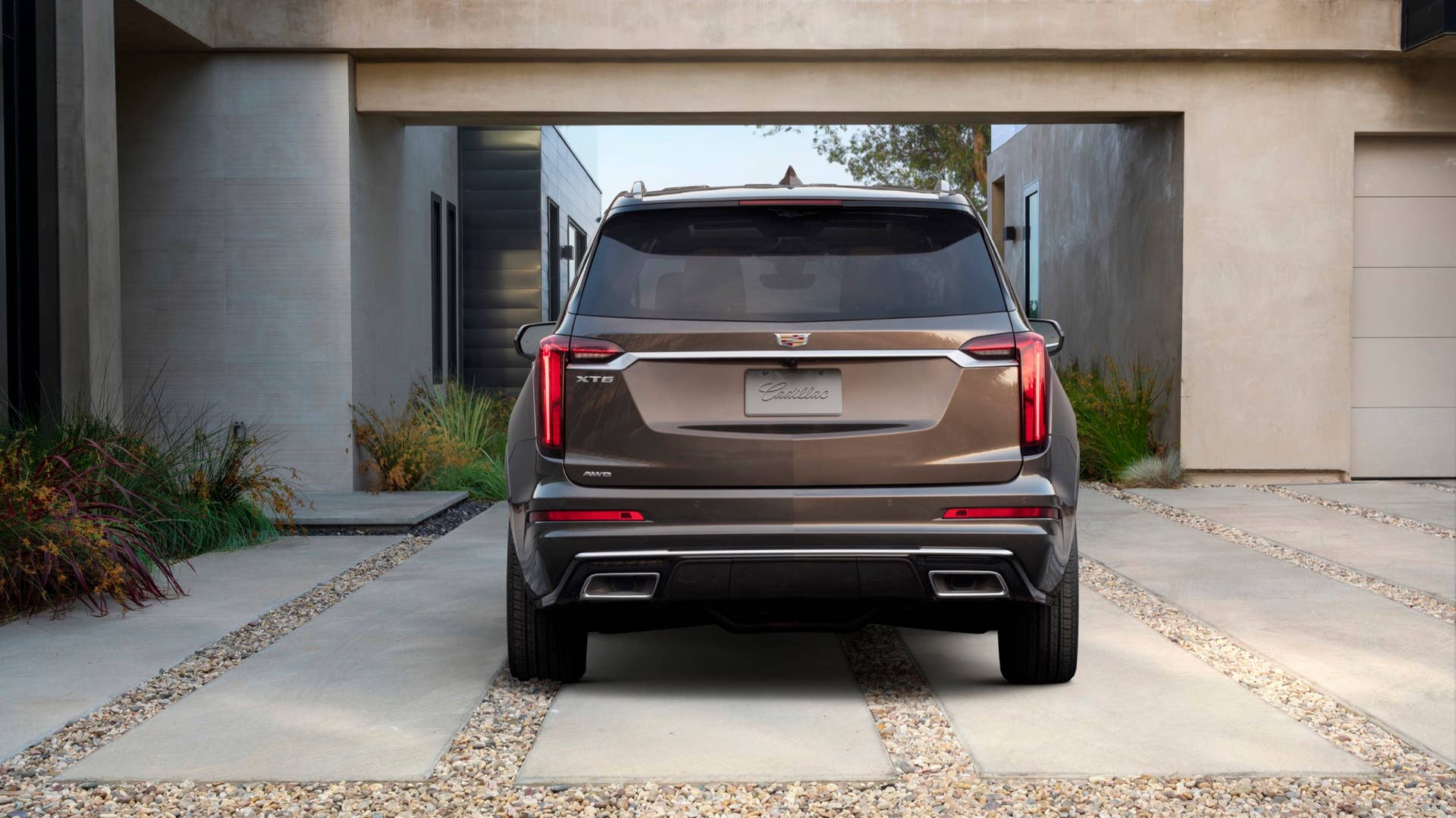 The Cadillac XT6 Premium Luxury model features unique front and rear fascias with red taillight lenses.