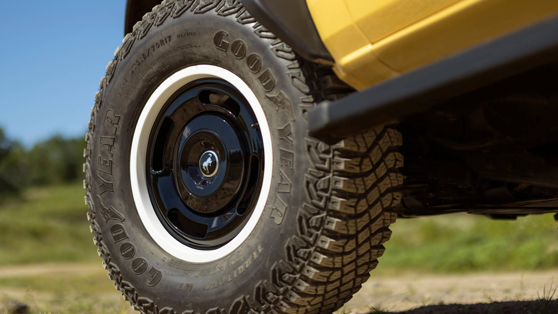 Bronco Heritage Limited Edition available winter 2023.  Limited availability. Preproduction models shown.  Always consult the Owner’s Manual before off-road driving, know your terrain and trail difficulty, and use appropriate safety gear.