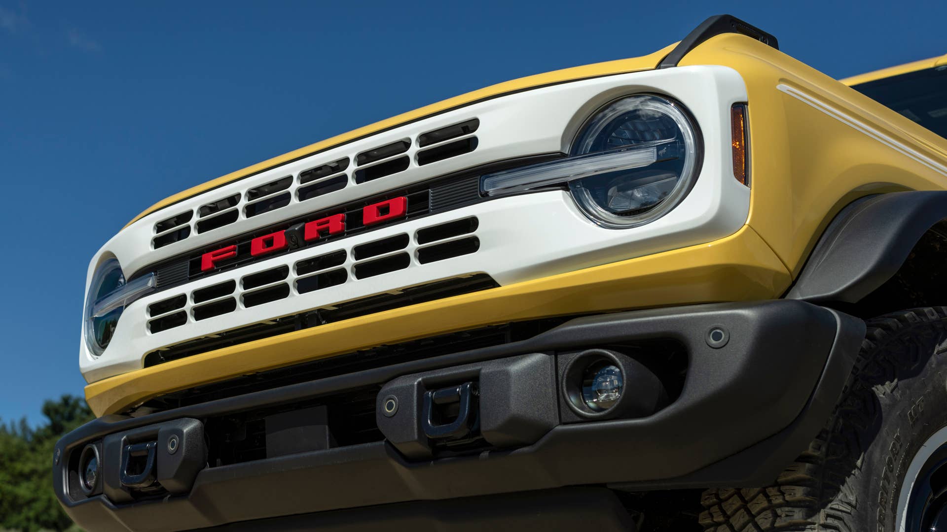 Bronco Heritage Limited Edition available winter 2023.  Limited availability. Preproduction models shown.  Always consult the Owner’s Manual before off-road driving, know your terrain and trail difficulty, and use appropriate safety gear.