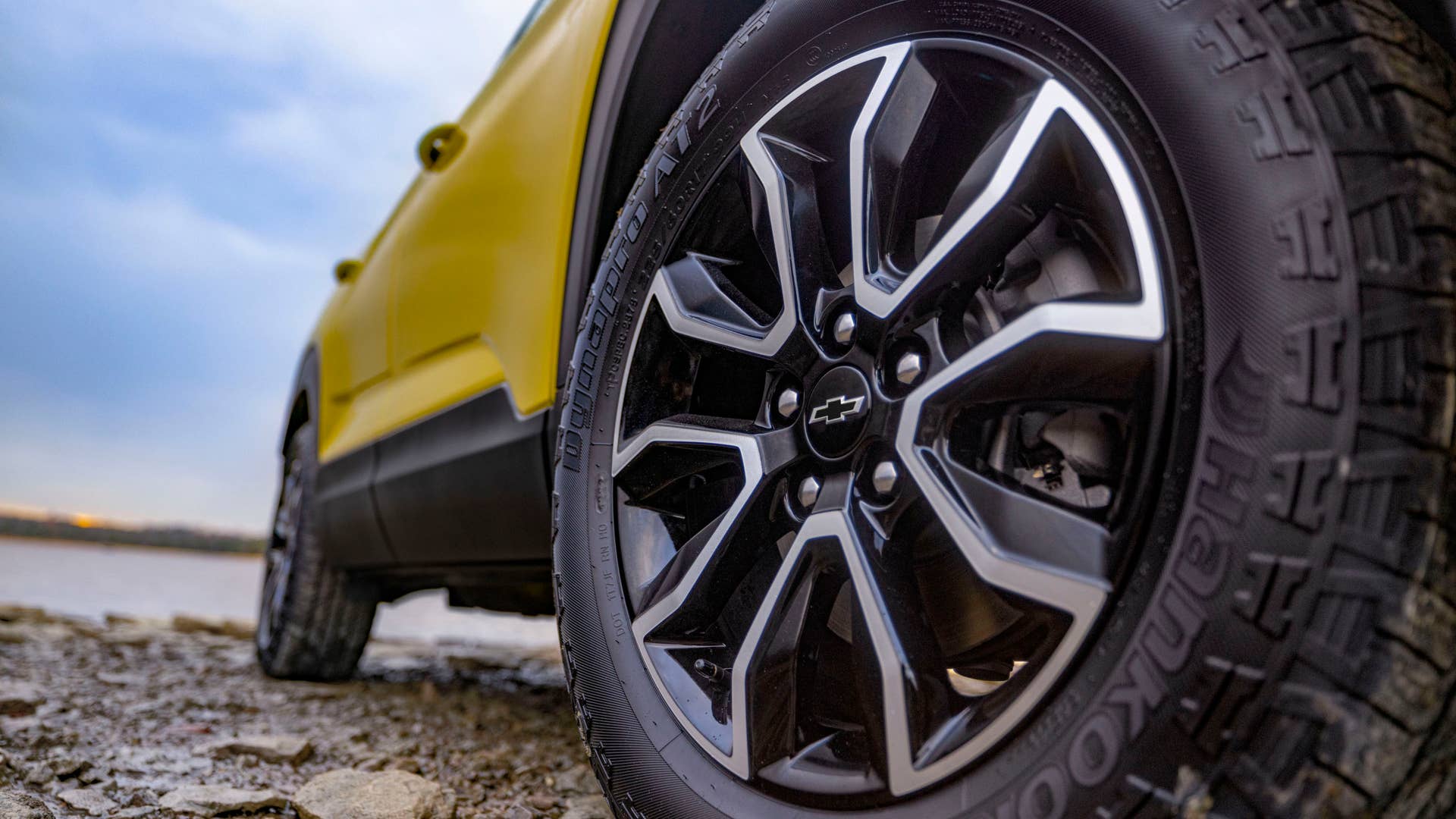 Close up view of passenger side wheel on 2024 Chevrolet Trailblazer ACTIV in Nitro Yellow Metallic. Preproduction model shown. Actual production model may vary. Available in fall 2023.