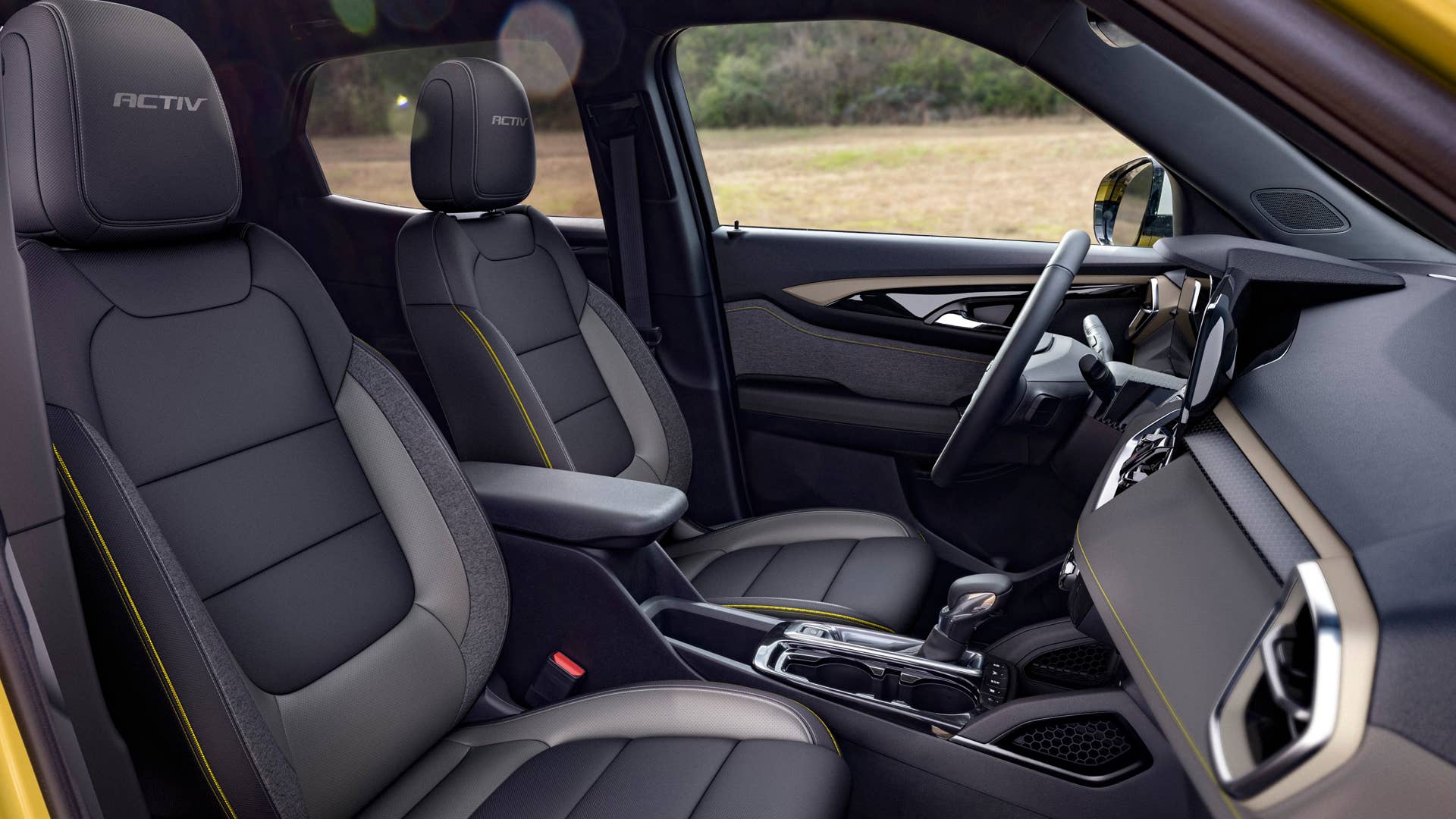 Passenger side view of front cabin in 2024 Chevrolet Trailblazer ACTIV with Jet Black with Artemis interior. Preproduction model shown. Actual production model may vary. Available in fall 2023.