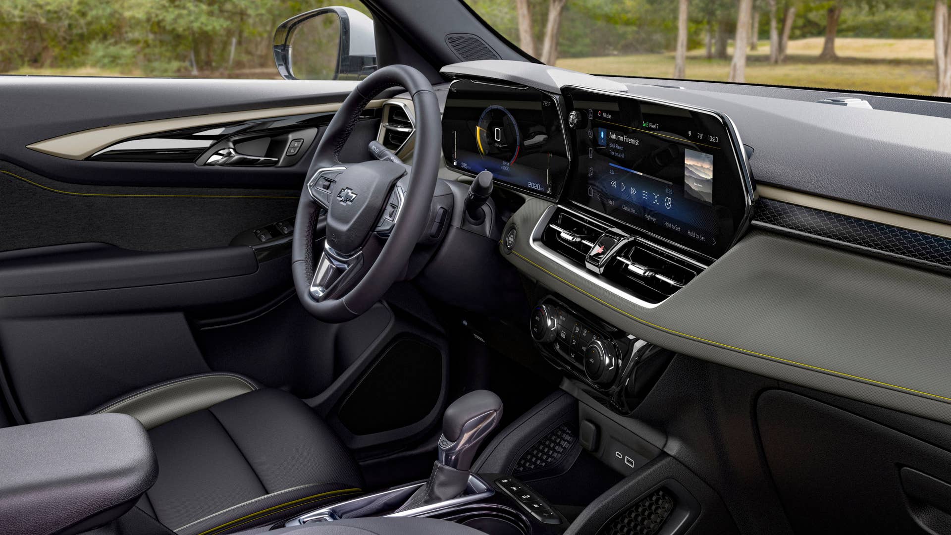 View of the driver’s side of the front cabin in 2024 Chevrolet Trailblazer ACTIV in Nitro Yellow Metallic with Jet Black with Artemis interior. Preproduction model shown. Actual production model may vary. Available in fall 2023.