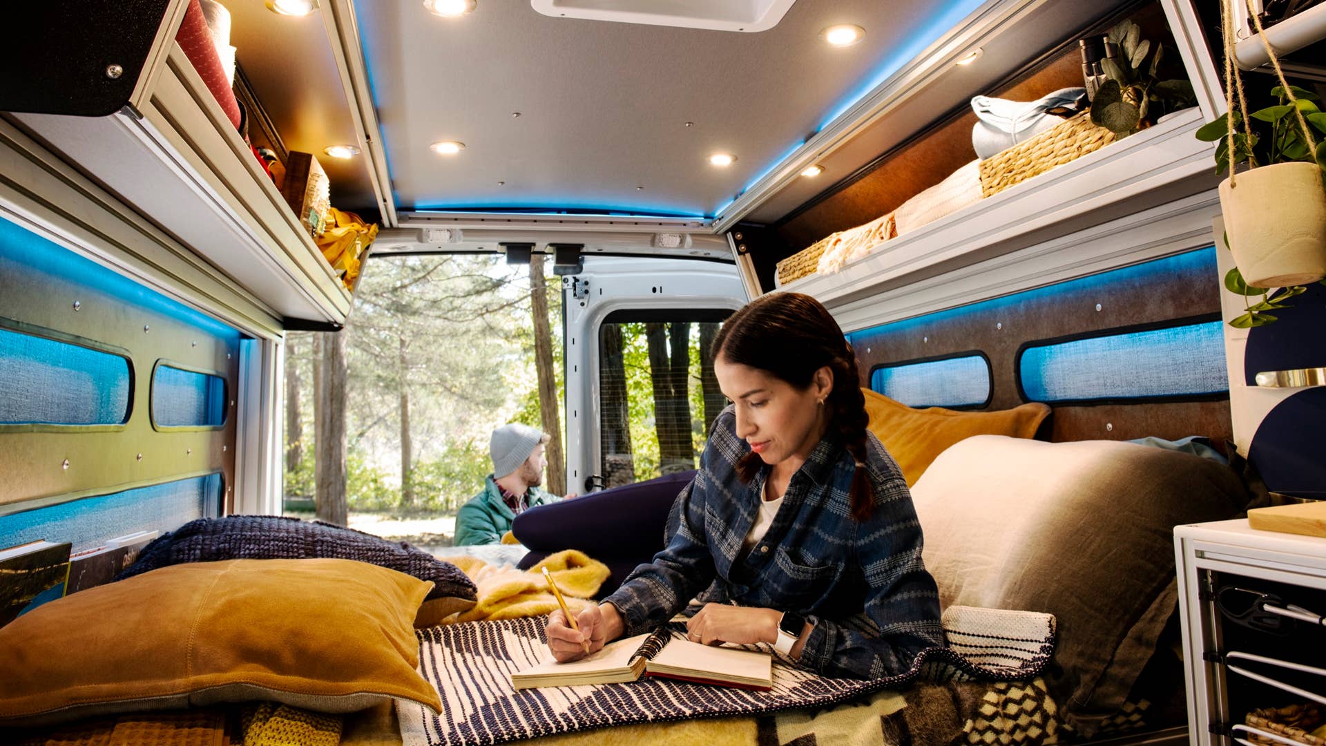 Transit Trail owners can benefit from access to the Ford Pro network of upfitters and interior installers to create the interior space they desire. (2023 Ford Transit Trail available fall 2022. Preproduction model shown with aftermarket equipment. Mood lightning, bed, storage bins, etc. not included.)