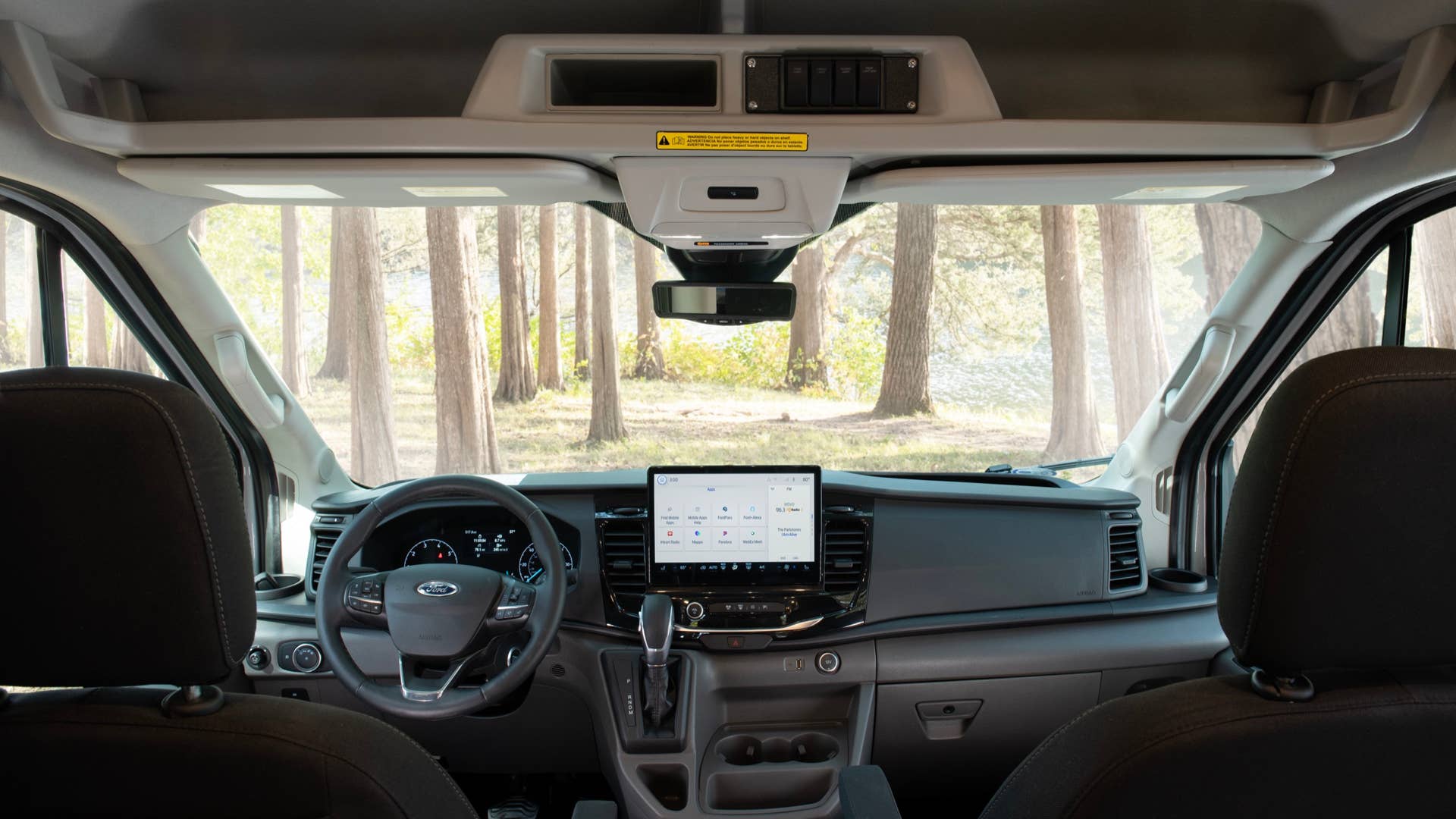 2023 Transit Trail Cab and Cab Shelf. (2023 Ford Transit Trail available Fall 2022. Preproduction model shown with aftermarket equipment.)