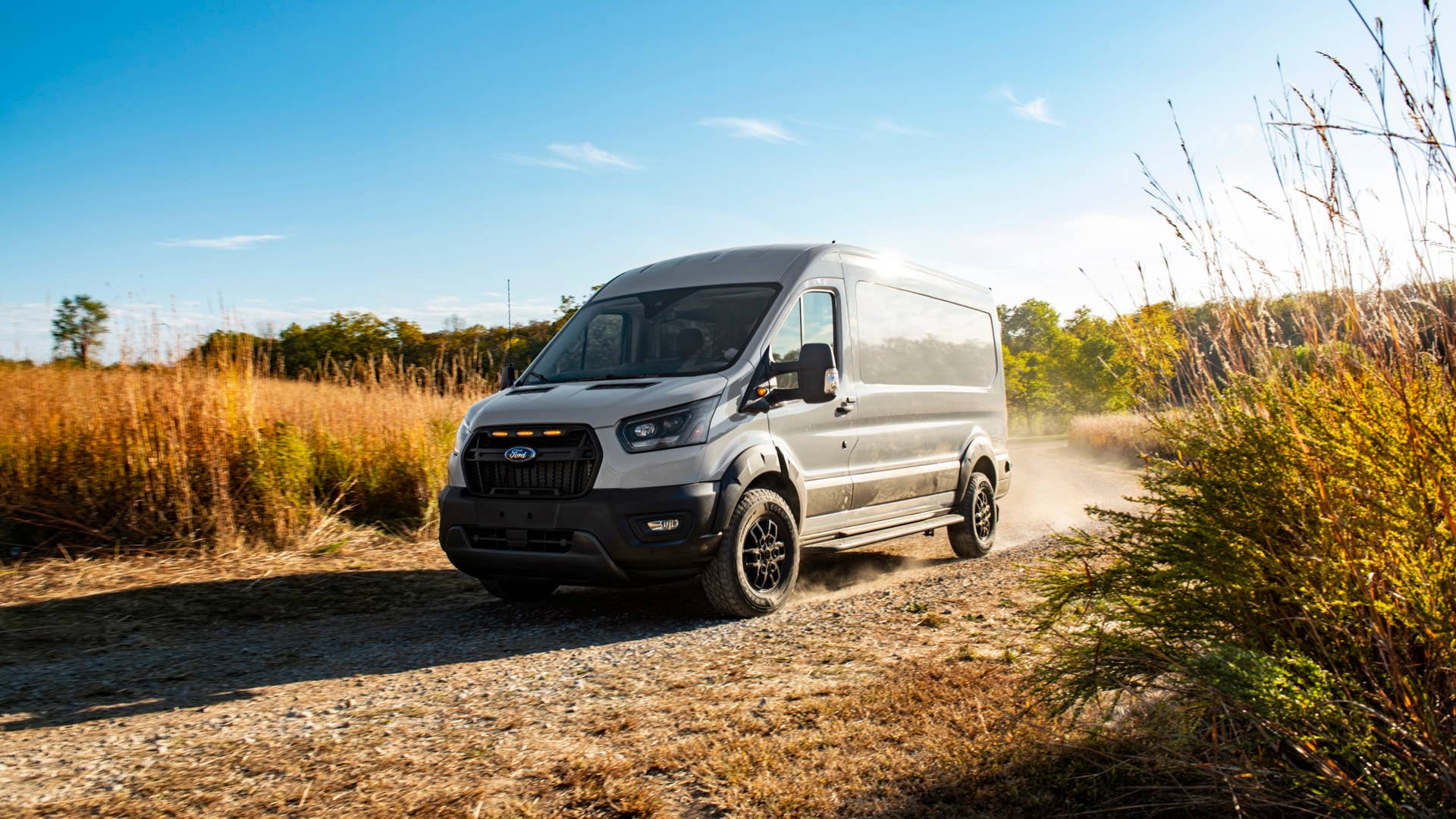 The new 2023 Transit Trail van continues the Ford tradition of providing travelers with vans, trucks and chassis built for life on and off the road. (2023 Ford Transit Trail available Fall 2022. Preproduction model shown. Always consulate Owner's Manual before off-road driving, know your terrain trail difficult, and use appropriate safety gear.)