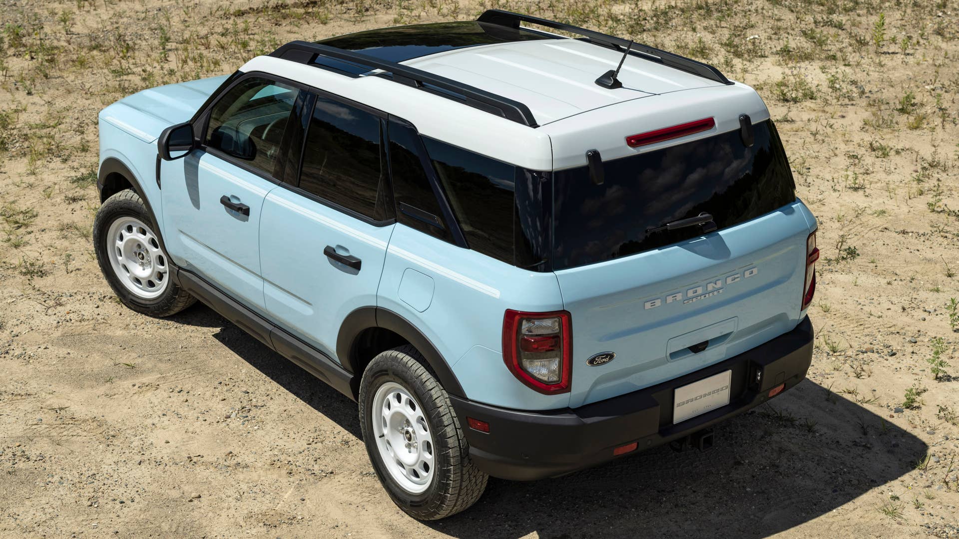 Bronco Heritage Edition available winter 2023. Limited availability. Preproduction models shown.  Always consult the Owner’s Manual before off-road driving, know your terrain and trail difficulty, and use appropriate safety gear.