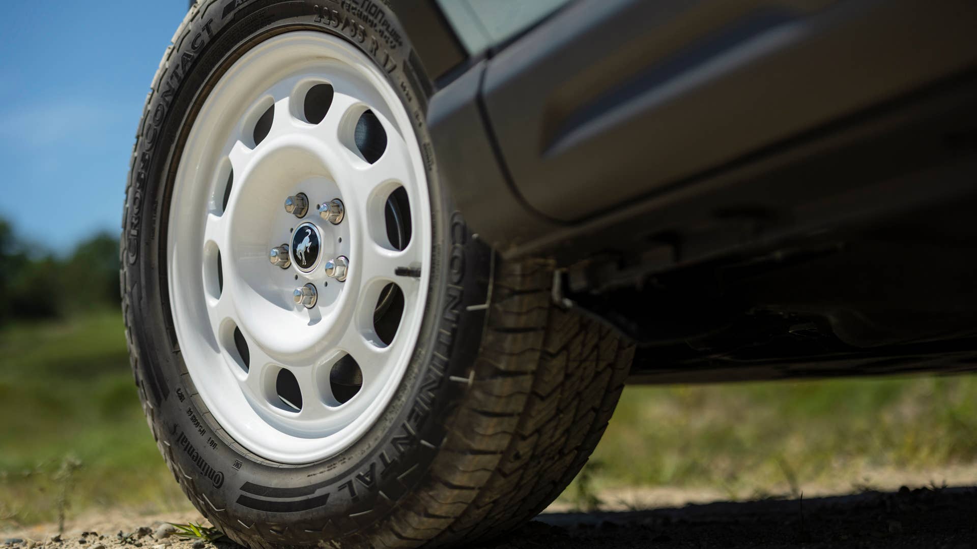 Bronco Heritage Edition available winter 2023. Limited availability. Preproduction models shown.  Always consult the Owner’s Manual before off-road driving, know your terrain and trail difficulty, and use appropriate safety gear.