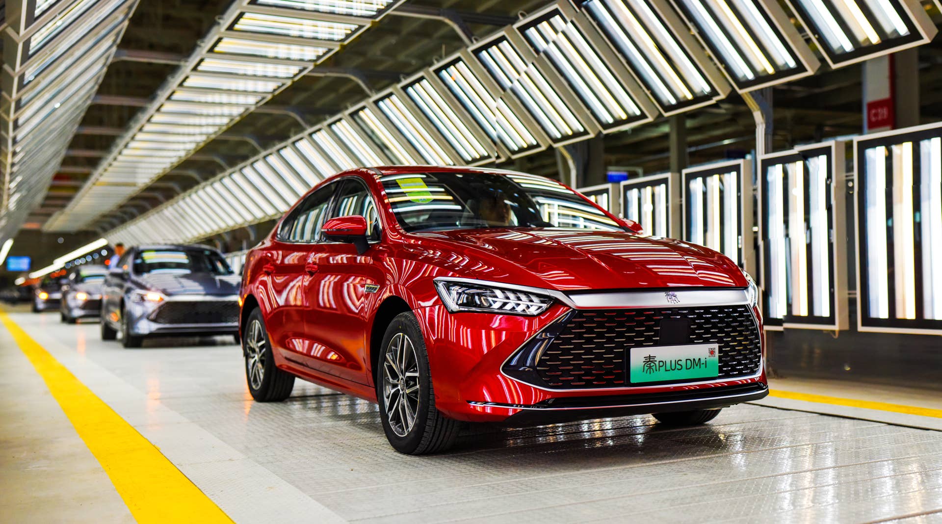 CHANGFENG, CHINA - JUNE 30: The first vehicle, a Qin Plus DM-i sedan, rolls off the assembly line at BYD's new manufacturing base on June 30, 2022 in Changfeng County, Hefei City, Anhui Province of China. (Photo by VCG/VCG via Getty Images)