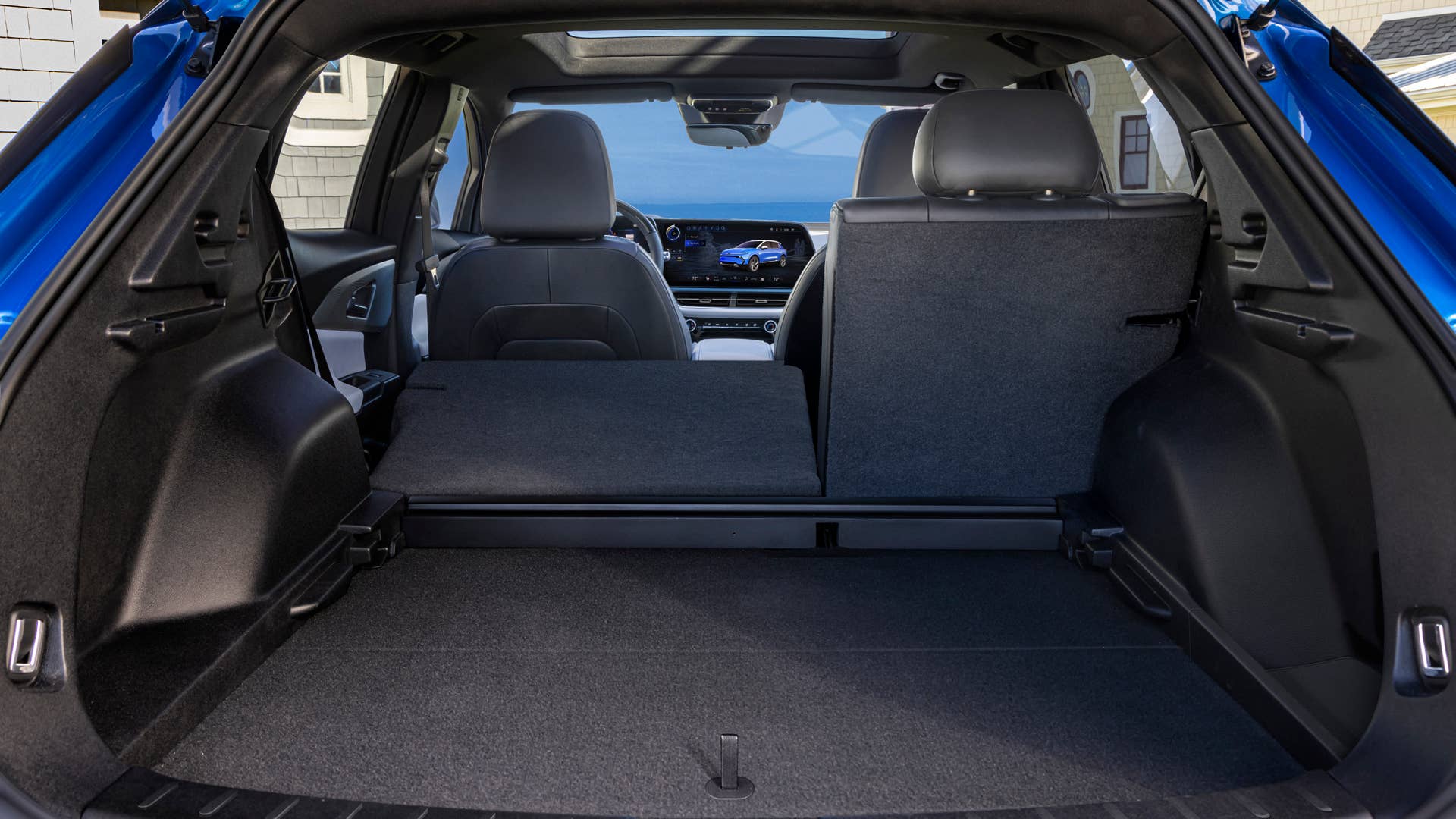 View of rear cargo space in 2024 Chevrolet Equinox EV 3LT. Preproduction model shown. Actual production model may vary. 2024 Chevrolet Equinox EV available Fall 2023.
