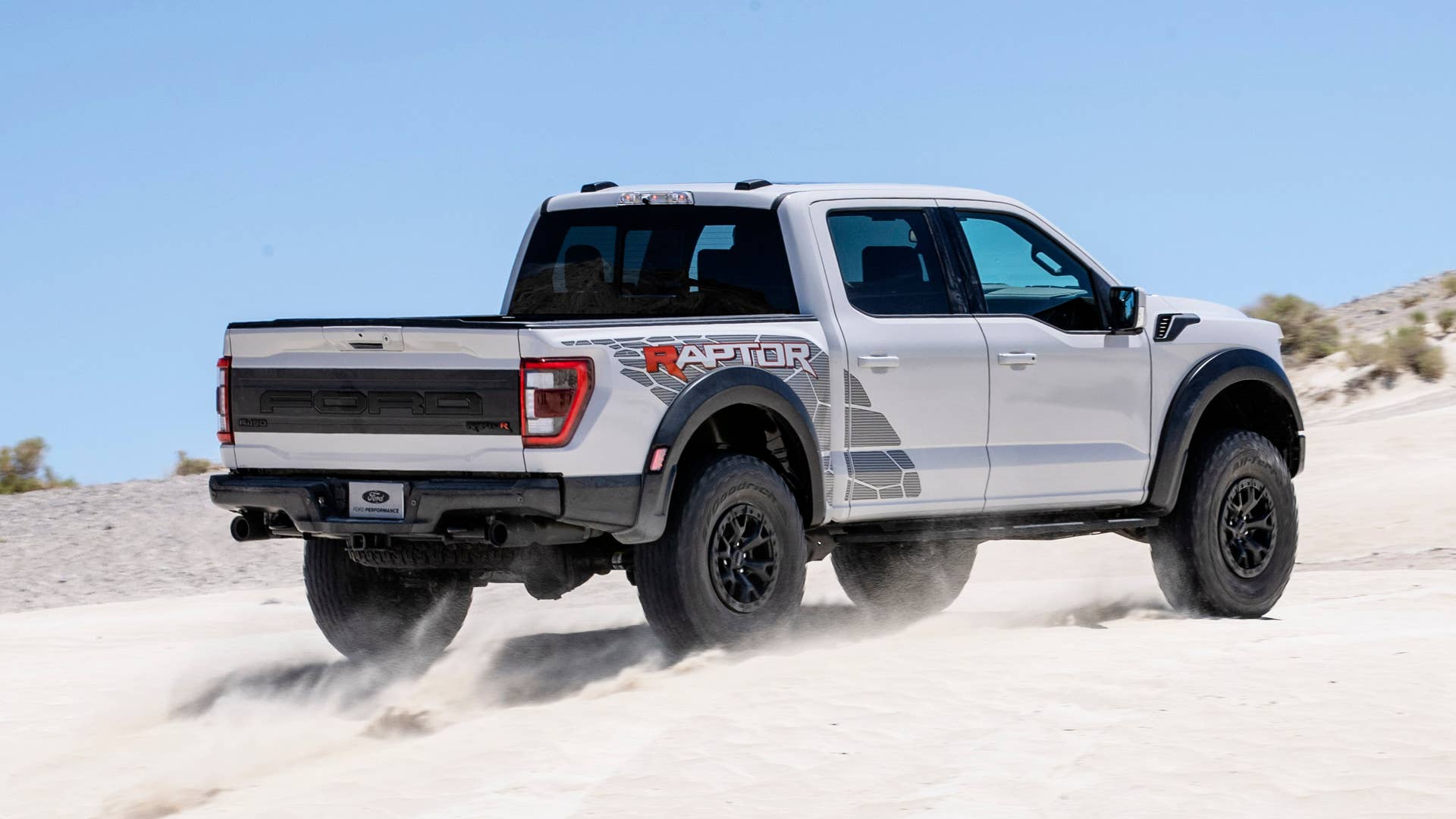 Preproduction model with optional equipment shown. Available late 2022. Professional driver on a closed course. Always consult the Raptor supplement to the Owner’s Manual before off-road driving, know your terrain and trail difficulty, and use appropriate safety gear.