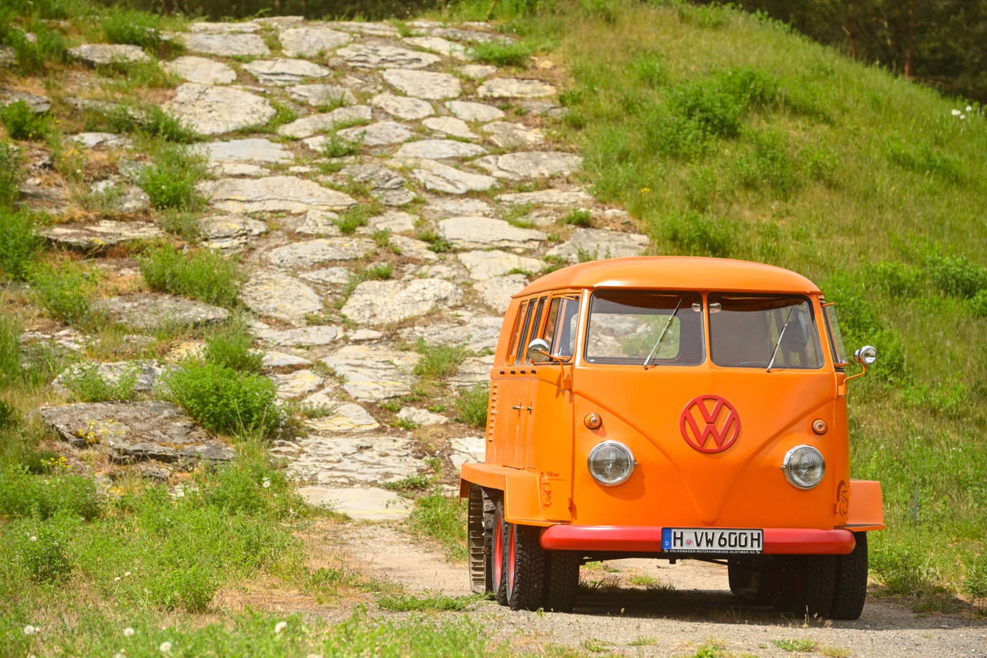 VW restores rare split-window Bus with tank-like tracks - Autoblog
