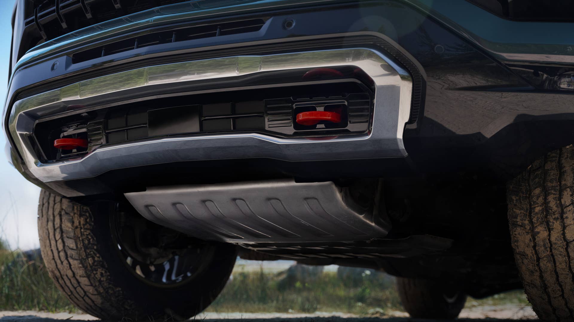 Detailed shot of skid plate and red tow hooks on the 2025 Tahoe Z71