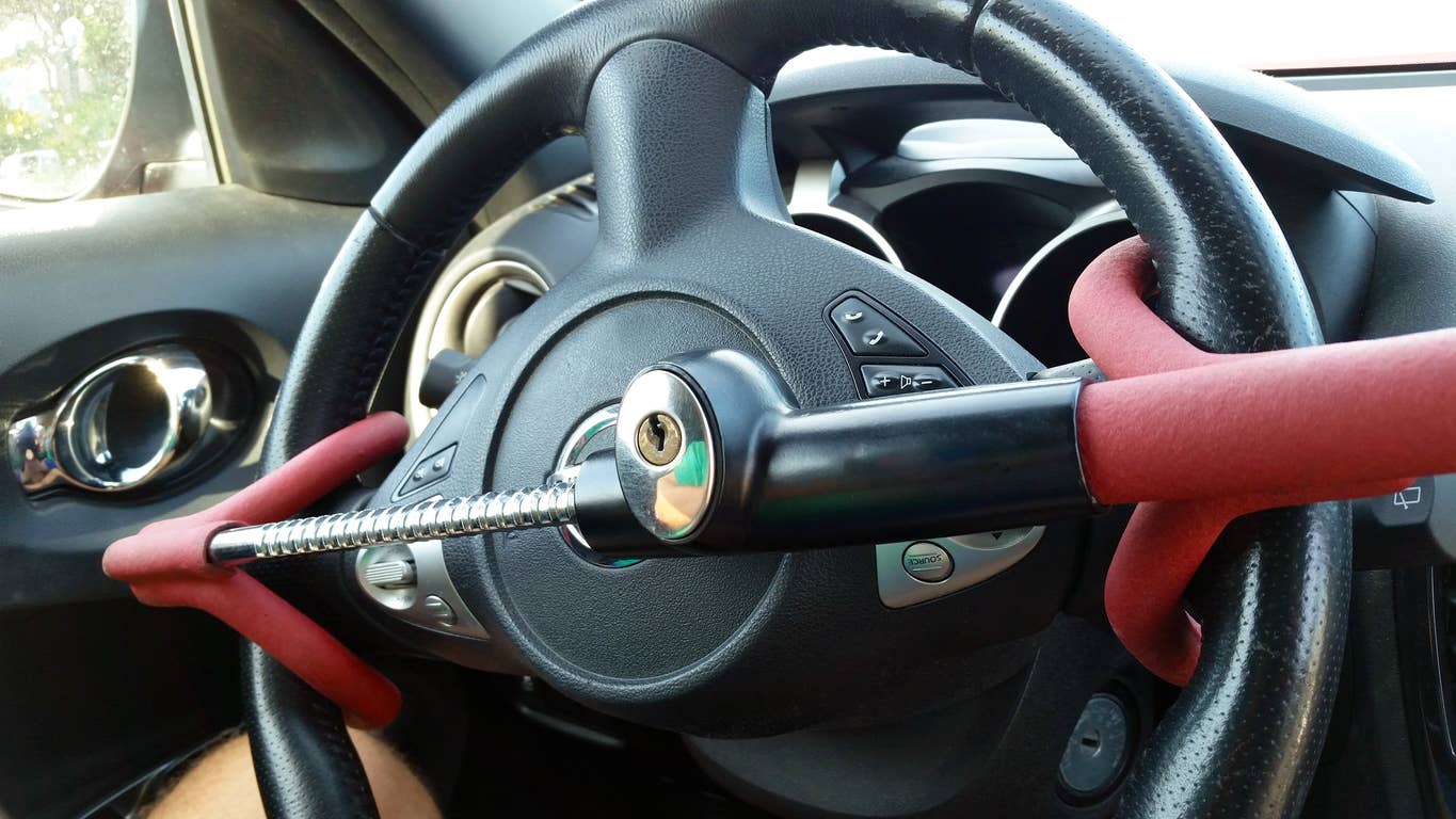 black  &  red colors anti-theft car steering wheel lock. Black  &  red colors