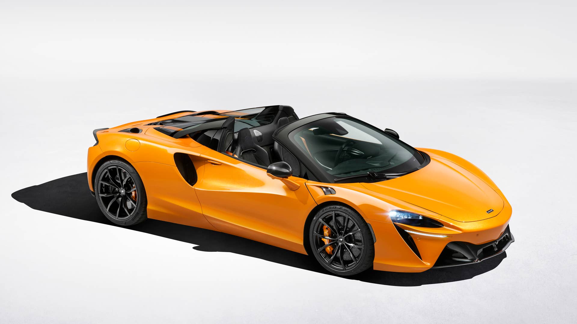 2025 McLaren Artura Spider roof down front angled view