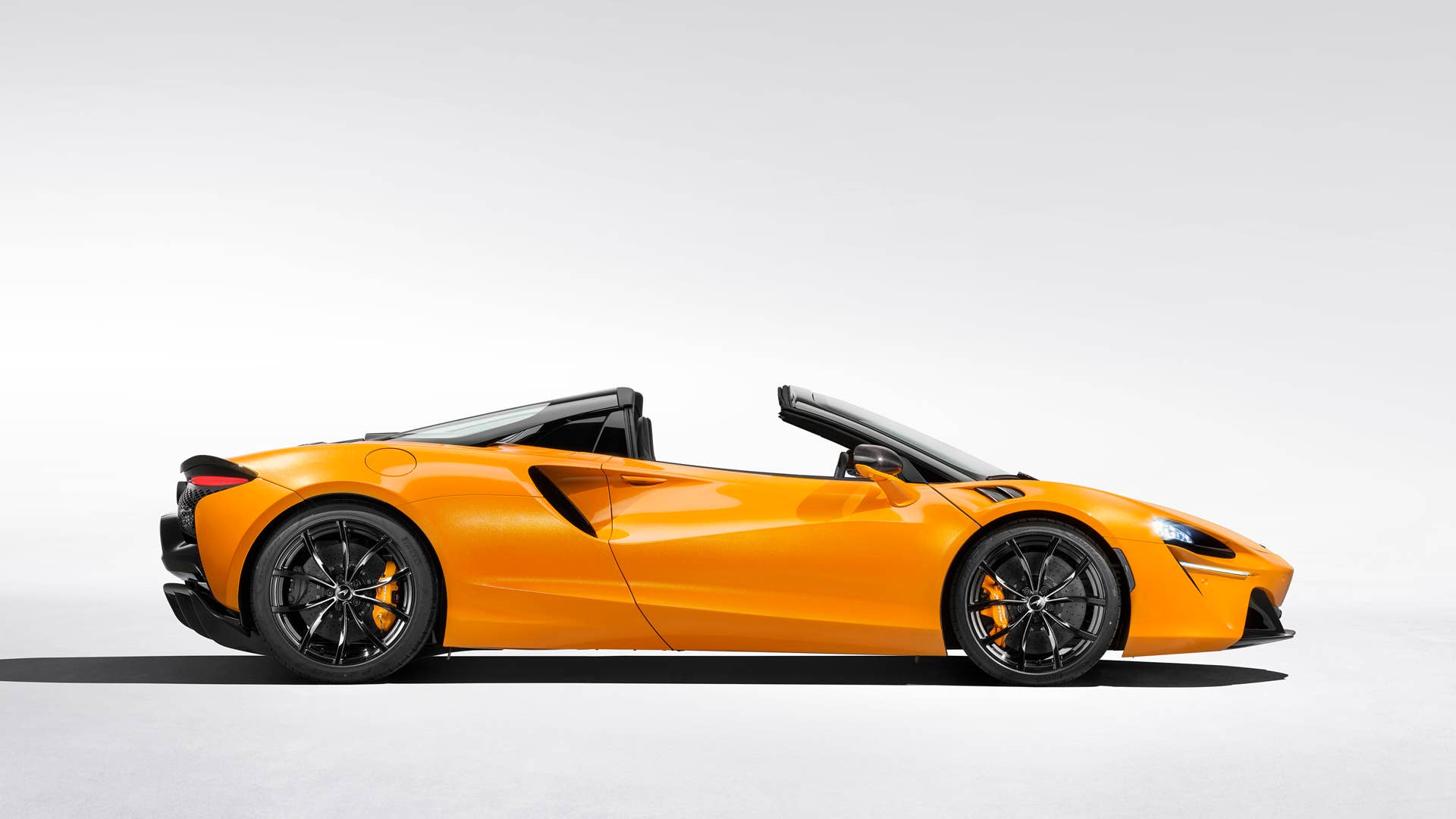 2025 McLaren Artura Spider roof down side view