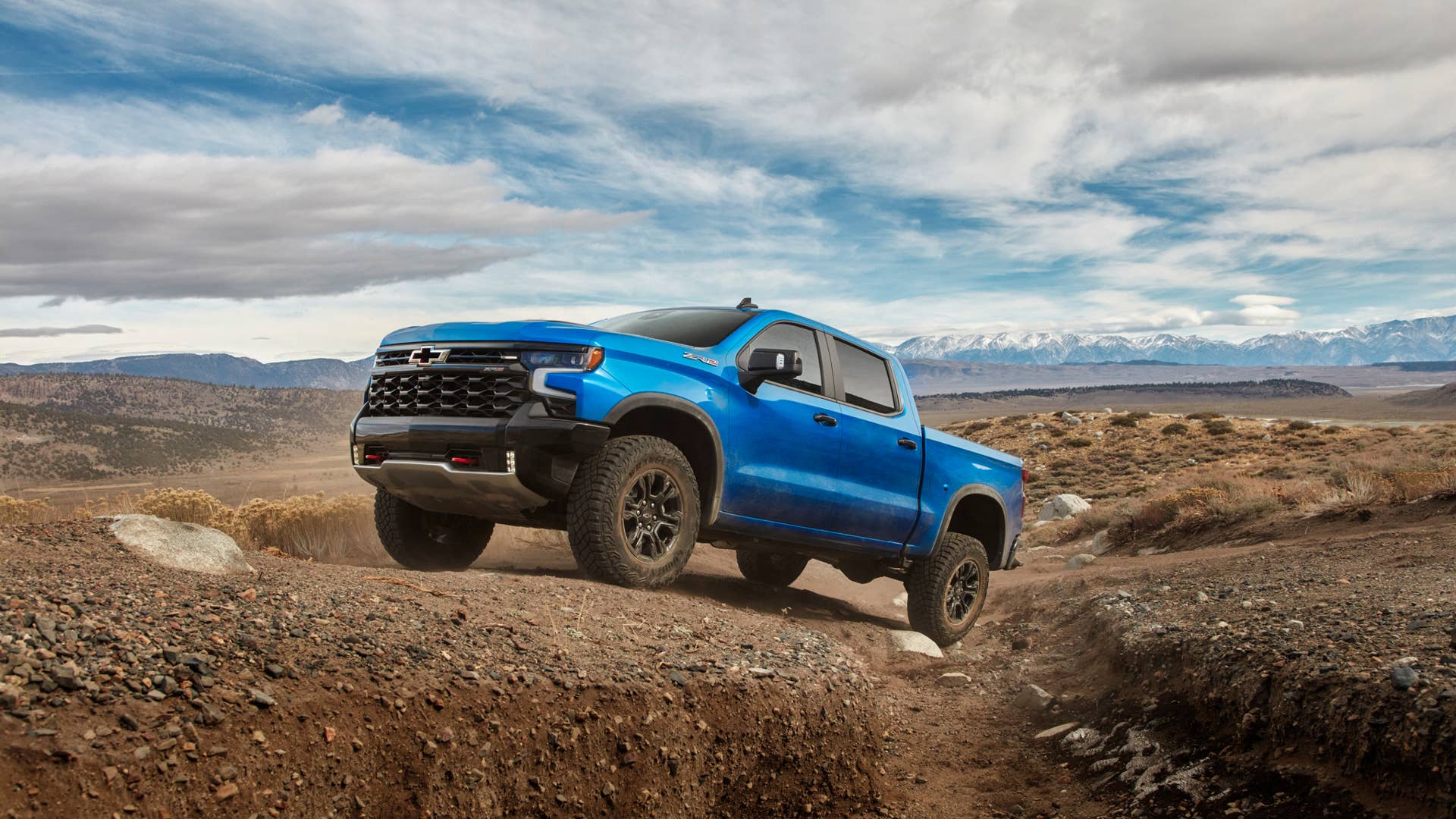 The 2024 Chevrolet Silverado ZR2 on a desert off-road trail.