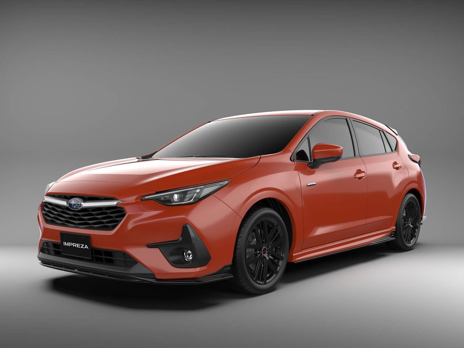 2024 Subaru Impreza w/ STI appearance package red front angled view