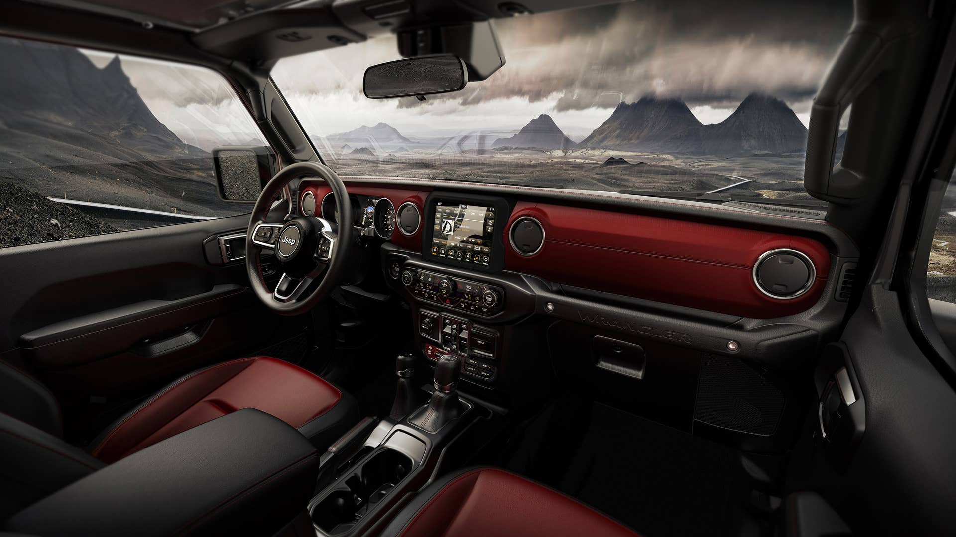 The 2023 Jeep® Wrangler Rubicon 20th Anniversary editions feature unique red-and-black leather seats, red leather-wrapped instrument panel bolster and “RUBICON 20TH” special shifter medallion