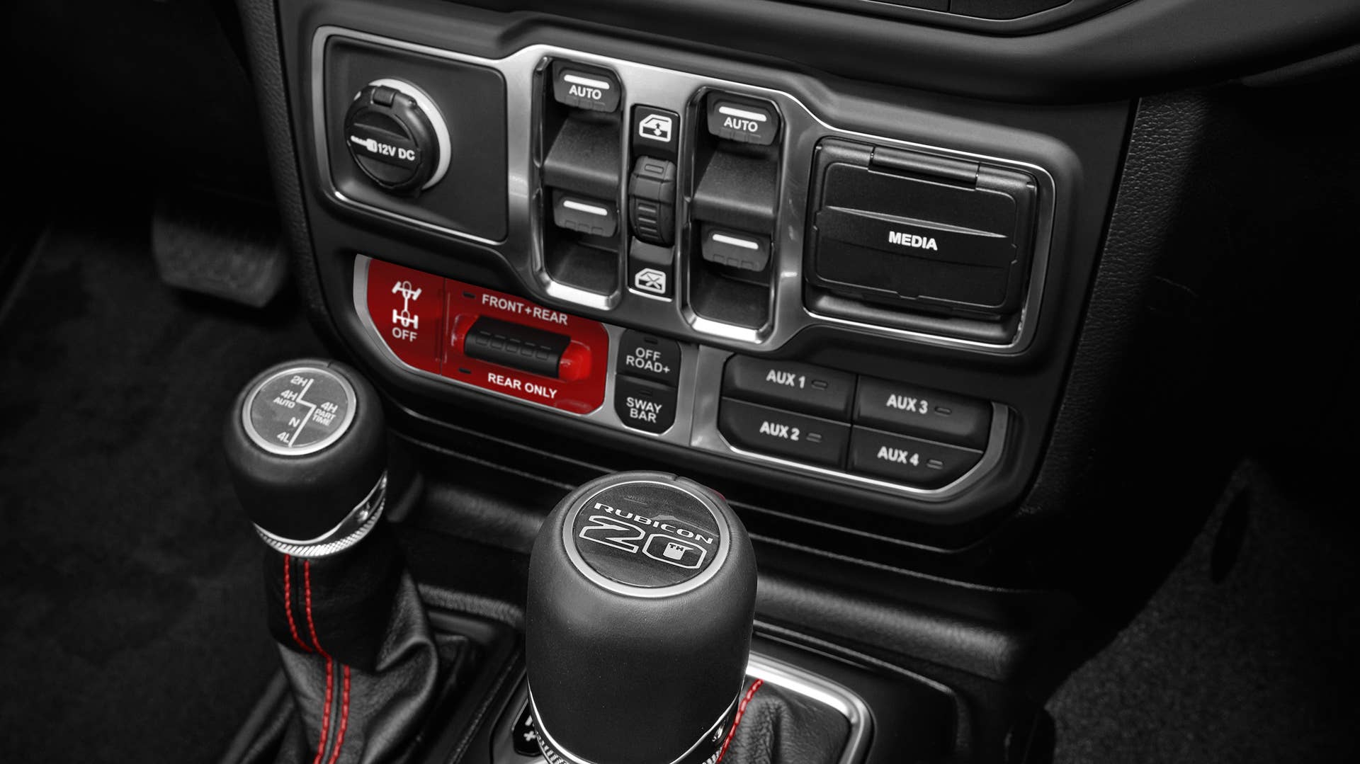 The 2023 Jeep® Wrangler Rubicon 20th Anniversary editions feature a special “RUBICON 20TH” shifter medallion