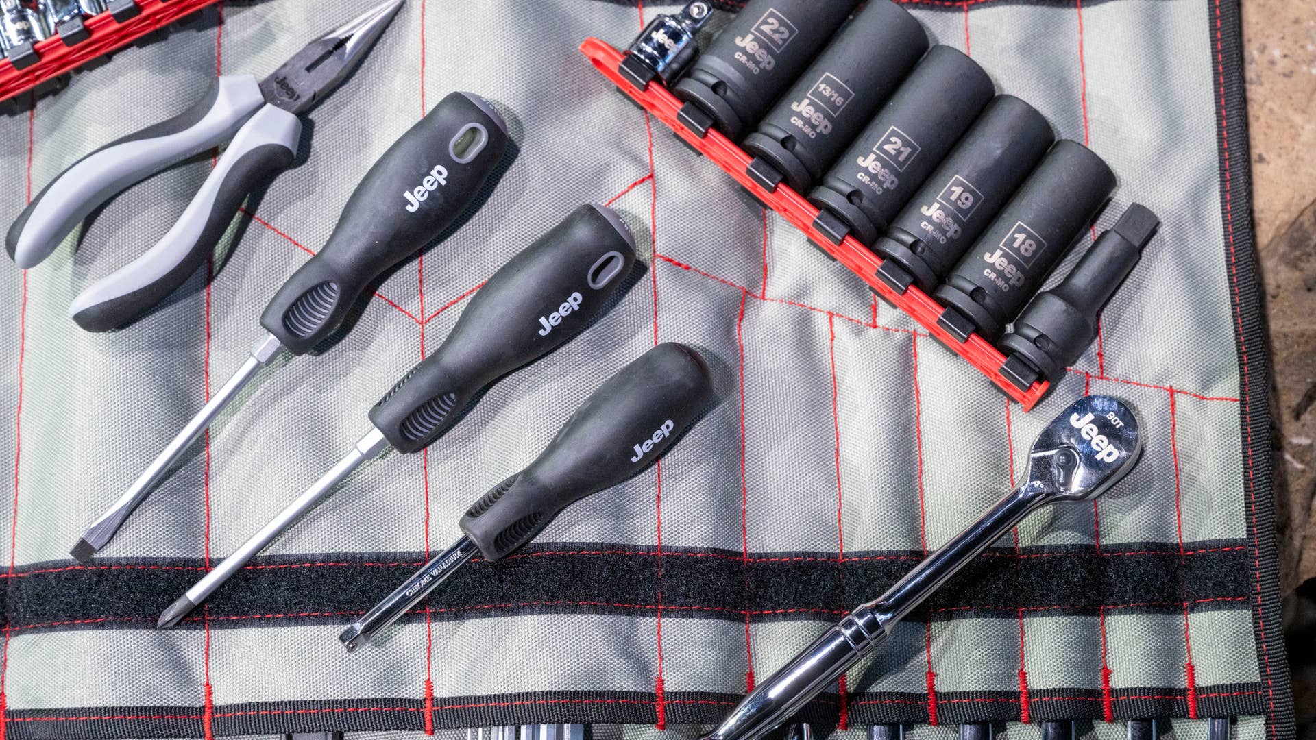 Rubicon 20th Anniversary editions of the 2023 Jeep® Wrangler Rubicon 4xe and Rubicon 392 come standard with a special 83-piece tool kit and custom canvas bag
