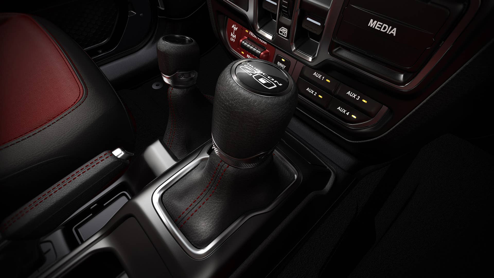 The 2023 Jeep® Wrangler Rubicon 20th Anniversary editions feature unique red-and-black leather seats and special “RUBICON 20TH” shifter medallion