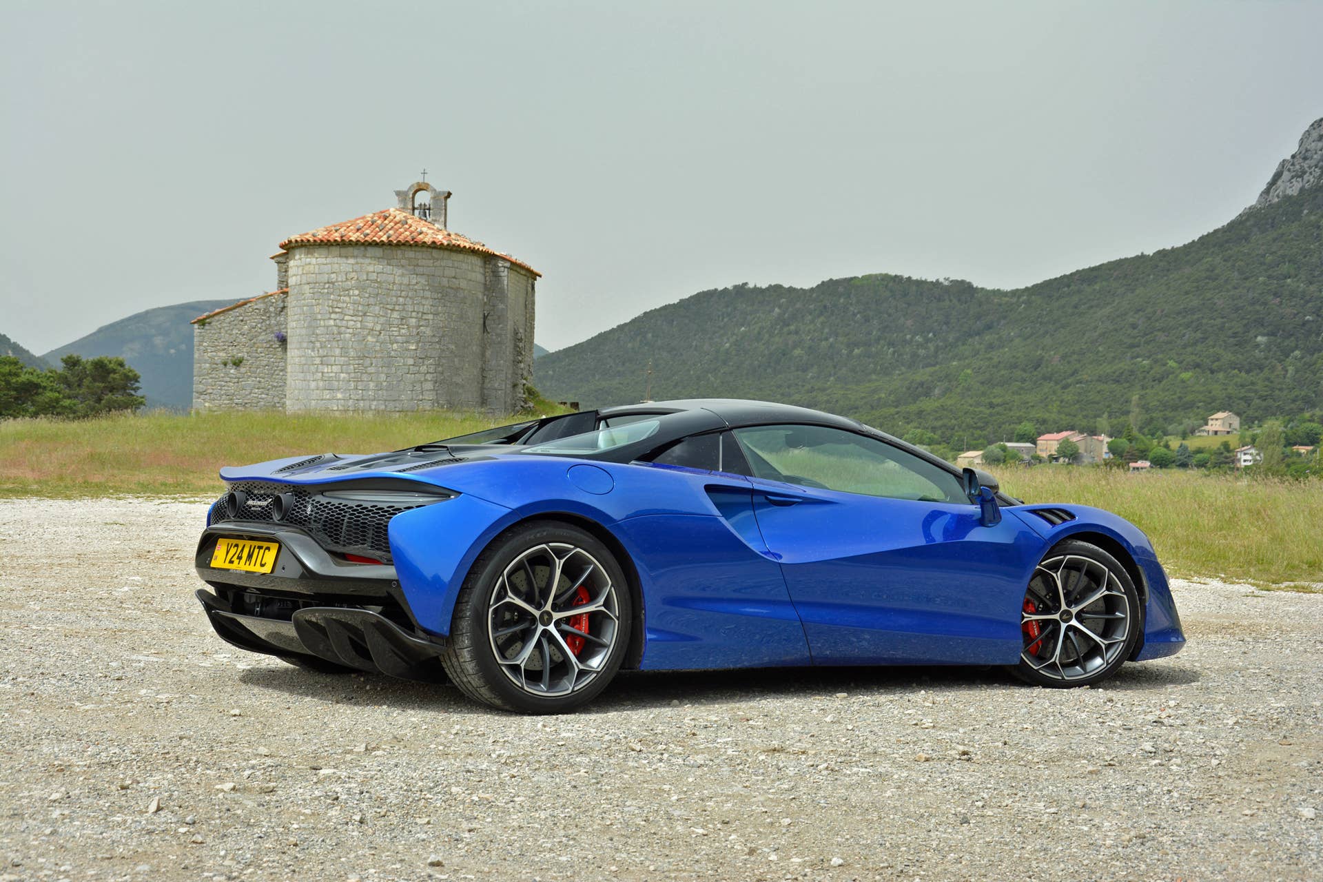 2025 McLaren Artura Spider in blue rear angled view