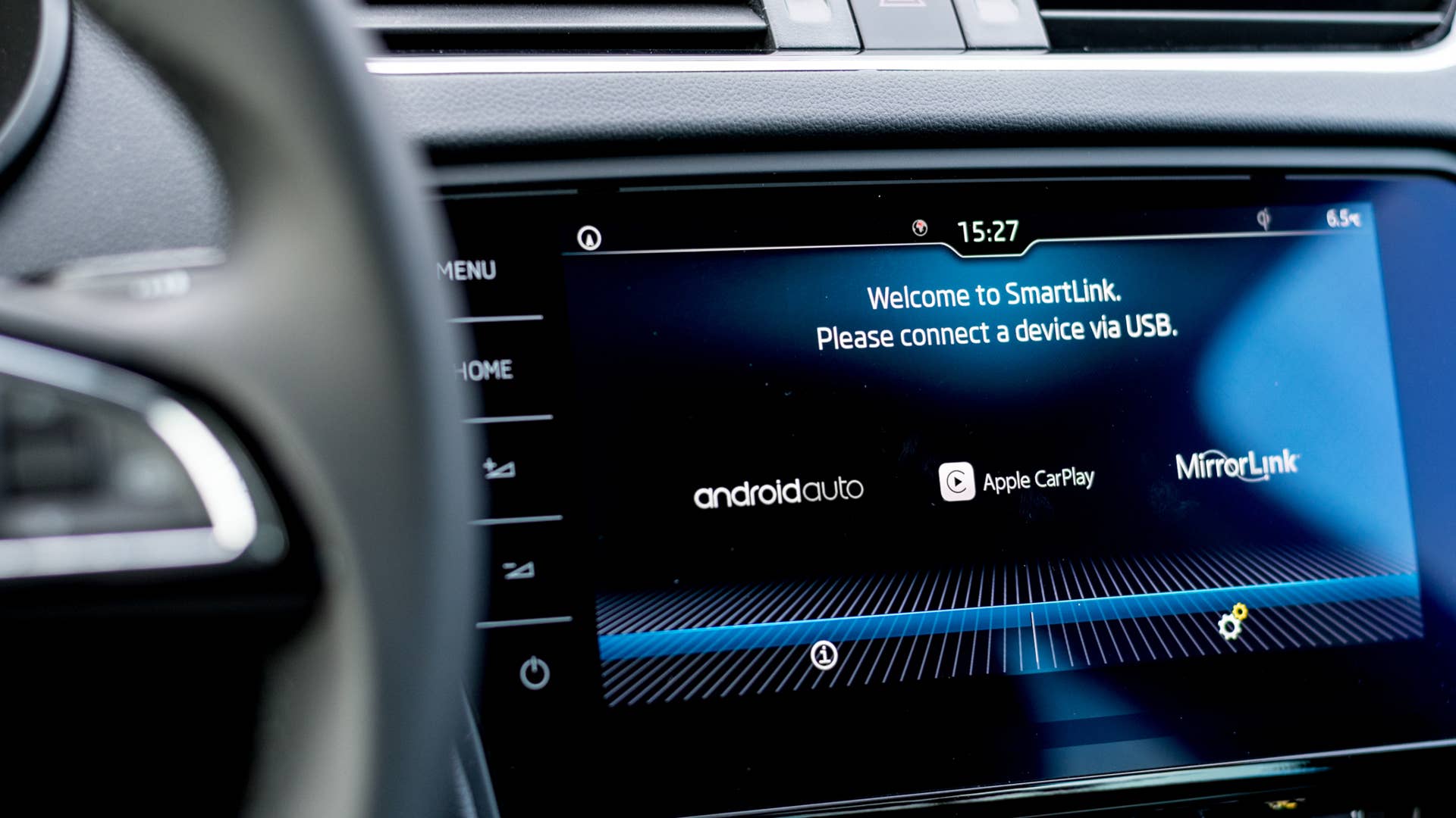 MISKOLC, HUNGARY - FEBRUARY 17, 2018: On board computer in a modern car displaying available phone connection services like Android Auto and Apple CarPlay