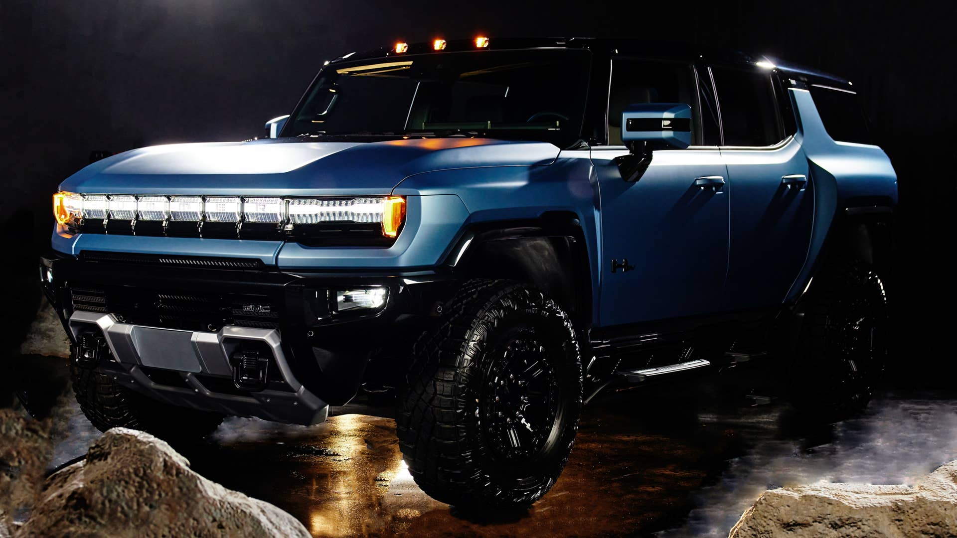 2024 GMC HUMMER EV Omega Edition SUV featuring exclusive Neptune Blue Matte exterior color and blacked-out accents.