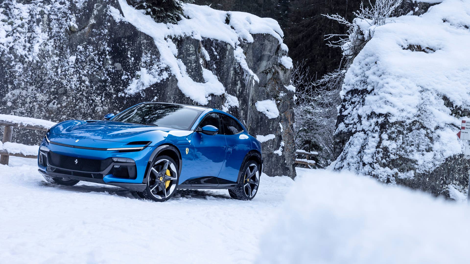 Ferrari Purosangue front three quarter blue in the snow